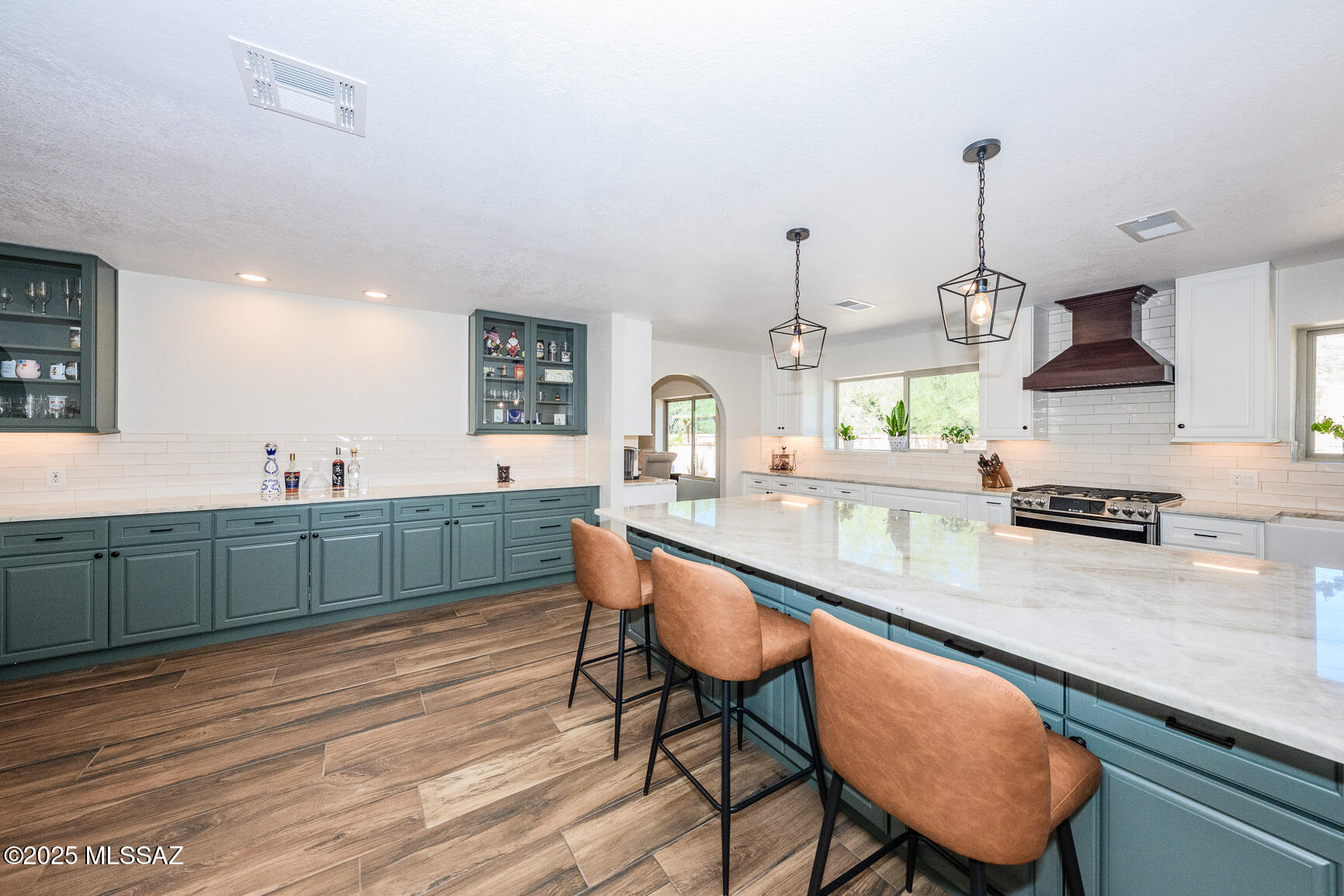 Close to Sabino Canyon & NEW KITCHEN UPDATE!  Stunning LIght & Open plan with Ample Taj Mahal quartz counters, Pantry, Tabasco Cask Wood plank look Tile flooring in front of home, Pella windows, Enjoy Refreshing pool and Sunset and Mountain Views! 2 AC units are both TRANE and one installed in 2022. Large Walled yard with refreshing pool, room for trampoline, playset camper, trailers,etc. Dist 16 Schools,  Must see!