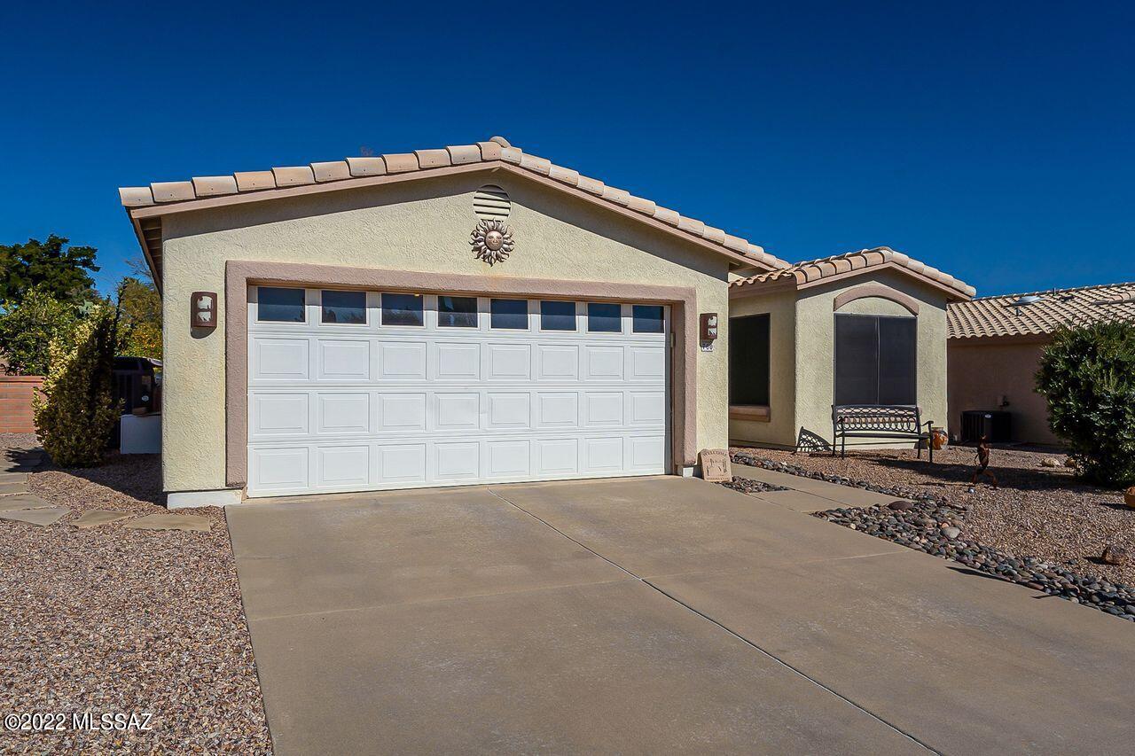 An air of Santa Barbara in The Villages.  Free-standing 2x6 Frame & Stucco home with attractive tile roof lines and an oasis atmosphere in the back yard.  Home comes furnished per Inventory List! (See Documents) 2BR/2BA, Great Room, Pot shelves, archways, 100% Tile flooring, and a 2-Car Garage.   Hot Tub is negotiable.   There are mature fruit trees in back yard (Lime, kumquat, tangerine, orange and grapefruit), artificial turf, and a spacious covered patio that's perfect for entertaining.   GVR membership is not on this home; but it is available.  The Villages of Green Valley HOA also has its own Rec Center with Pool, Spa, Tennis / Pickleball Courts, and more.  Great Neighbors!