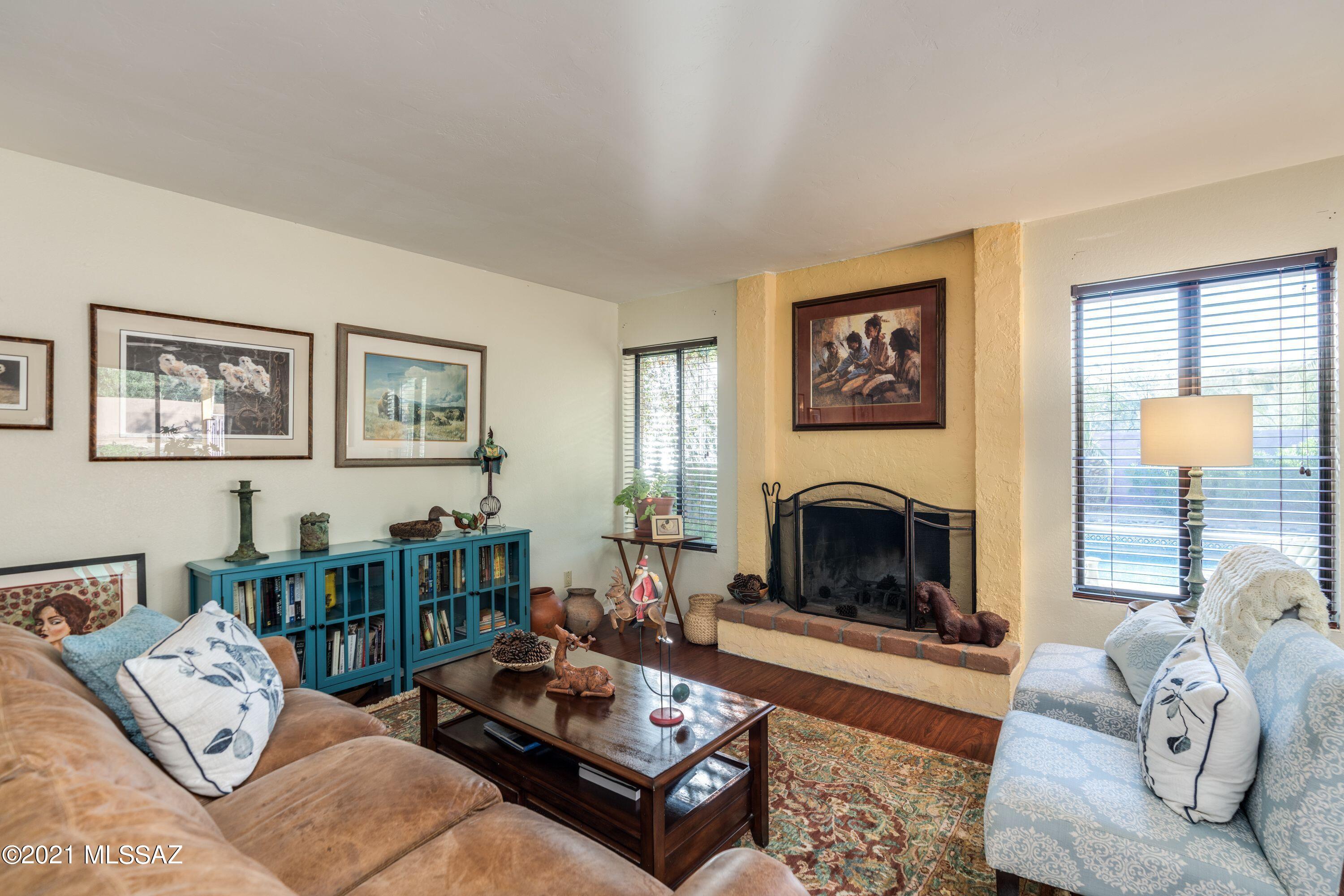 Great Location in the heart of the Catalina Foothills! Charming home on over a half acre!  3 bedrooms, 2 baths  Peaceful, private and plenty of space.  Cozy wood burning fireplace in the living room.  Great layout for entertaining.  
Tranquil, graceful, spacious and convenient!