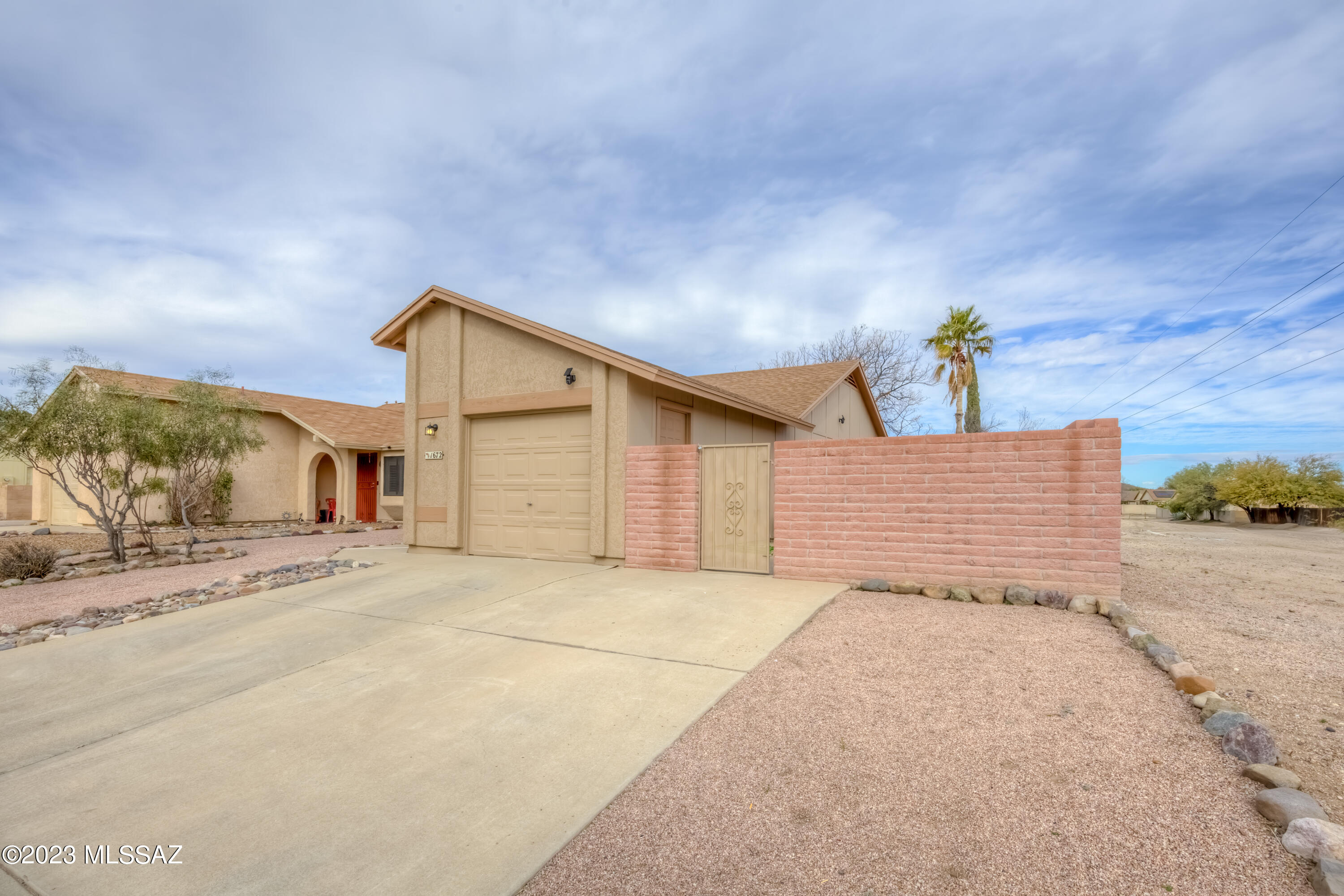Immaculate 3Br/2Ba/1car garage residence on a corner lot in desirable location w/ easy access to I-19, The Tucson Spectrum & The Loop. Bright floor plan with glass sliding doors from great room onto private spacious yard. Kitchen features breakfast bar, brand-new SS appliances, cabinets & countertops. Other brand-new features include the ROOF, flooring / plush carpet, fixtures, ceiling fans, modern paint, epoxy coated garage floors. Spacious primary bedroom has large closet! Many stylish upgrades and vaulted ceilings make this home feel like one of a kind! Community features pool.