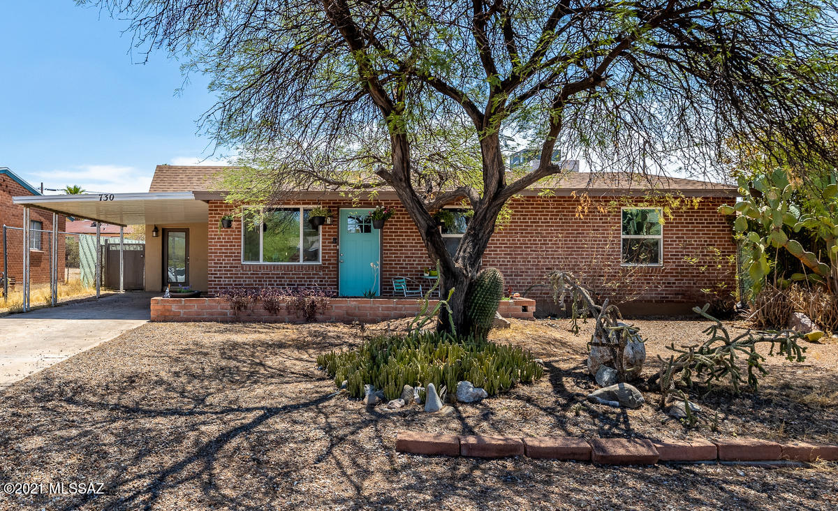 Remodeled 1950's mid century modern home in great central location; open floorplan, plank tile flooring in all common areas, kitchen features handsome  granite counters, stainless GE appliances, upgraded cabinetry.  Open living area: combination great room/dining room off kitchen and separate spacious living room. Split bedroom floorplan.  Master and guest baths finished with granite counters, double sink, and executive height cabinet. Bonus/flex room with high ceilings perfect for den or play room. Large east facing pool sized back yard perfect for entertaining, zoned gardening, or play areas. Central location gives convenient transportation to UA, Davis Monathon, TMC. Half a block from 3rd street bike UA bike route. Don't miss out on this spacious central charmer!