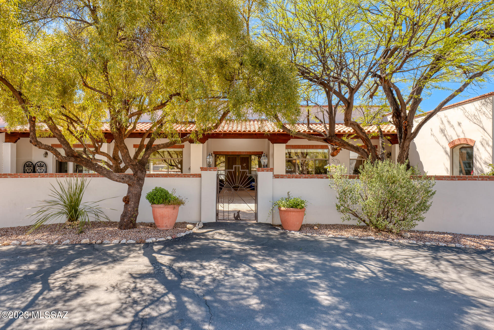 Home is range priced, Seller will accept or counter offers from $1,475,000 to $1,550,000.

Introducing a stunning and exclusive luxury residence nestled on over 3 ½ acres in the La Cebadilla community, offering breathtaking views of the Catalina and Rincon mountains. This masonry built home offers unparalleled craftsmanship and attention to detail with exceptional home features and exquisite natural exposed beams throughout, seamlessly blending with the surrounding natural beauty. 

The front yard boasts a covered patio with a tranquil water fountain, lush trees, and vibrant, colorful flowers, while the backyard offers a large covered patio with a seating area and TV, built-in BBQ, a sprawling lap pool, and a charming gazebo. Upon entering the grand foyer through large wooden French doors, you are greeted with an inviting ambiance that emanates throughout the entire home.

The kitchen is a chef's delight, boasting a large island with seating area, and top-of-the-line appliances to include a Bertazzoni gas cooking range.

The interior showcases a fireplace and exposed beams, creating a warm and inviting atmosphere. The master suite offers a serene retreat with a luxurious spa featuring a stand-alone soaking bathtub, double vanities, and abundant natural lighting with views of the Rincon mountain range. 

This magnificent estate also features a spacious laundry room with ample storage, a full-sized workshop, a fitness room, 3-car garage, and much more. With its stunning architecture, impeccable finishes, and extraordinary attention to detail, this luxurious home is truly an oasis of tranquility and indulgence on Tucson's East Side.