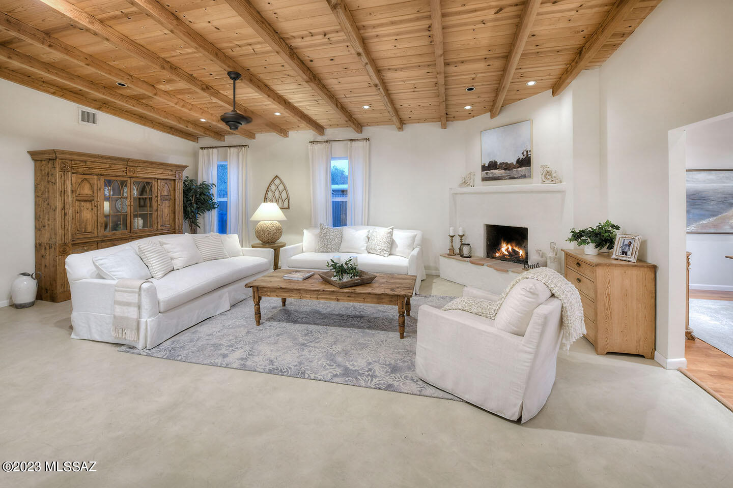 A home in historic Indian Ridge is always hard to come by.  A fabulous, large , updated one.. nearly impossible.  Envision open spaces that gracefully leads from one to the other.  A kitchen that was designed to be the heart of the home...  you know that kind of kitchen where everyone gathers?  This is it.  Soaring ceilings , light and airy,  and even anchored by a ''one of a kind'' iron beam.
Charming office or sitting room  as well. 
Master suite with amazing bath. Mountain  views, beautiful pool, and a patio you will live on.  A bonus is the HUGE backyard that is walled in and perfect to be made into a play yard, pickleball, or just cause you want a yard separate from everything else.  Honestly, I can't describe this well.   come see!
Read further to hear about the ''Ridge'' The "Ridge," as it is lovingly called by all who live there, is special.  The kind of community where luminaries light the streets every Christmas Eve...  The 4th of July has a parade complete with the fire trucks showing up, and once a year for the adults is a party at someone's home called "Retro at the Ridge". A community pool to join and even a swim team. Funny, but it still remains quiet and private...  you decide.  I know, I live there.