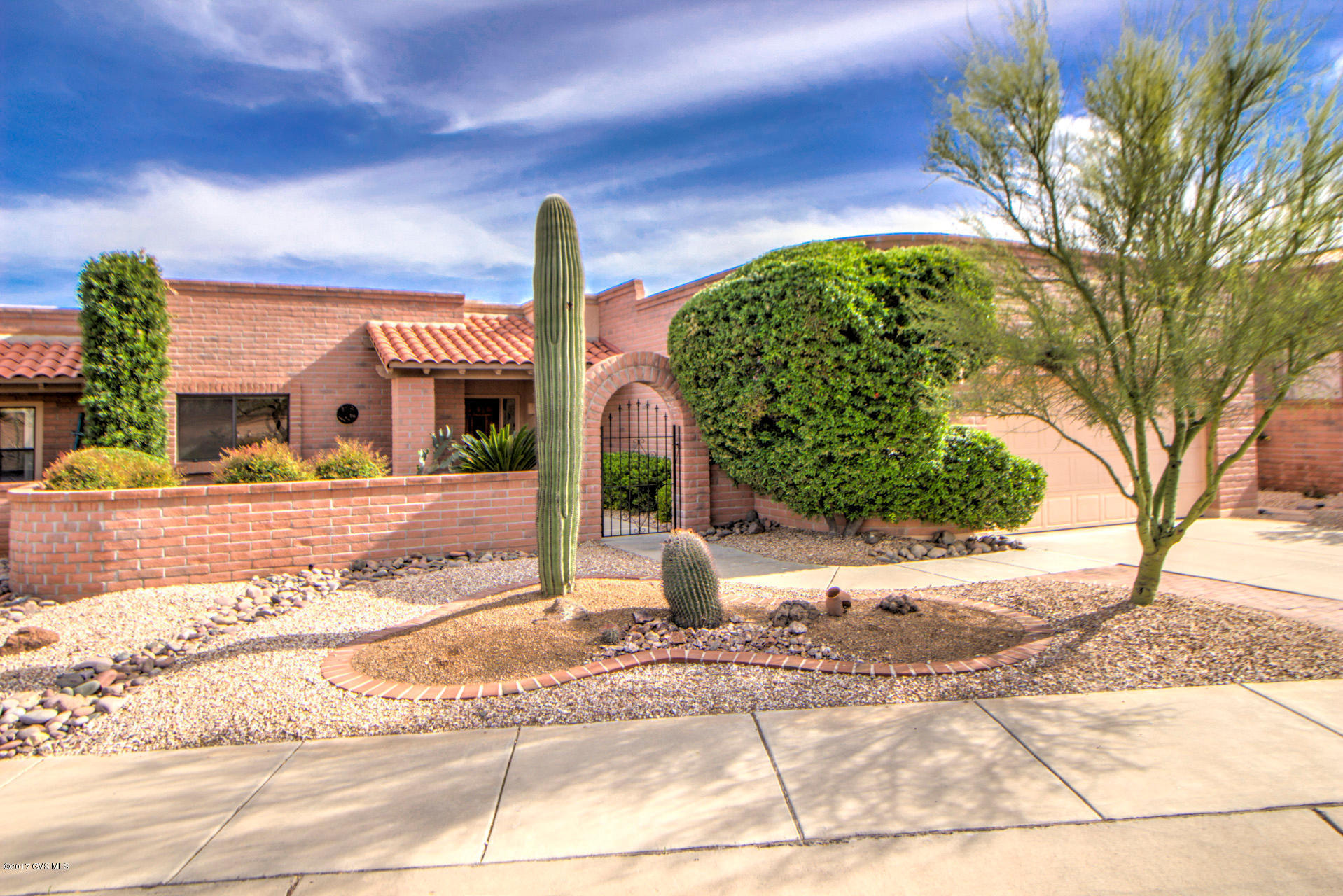 AN ABSOLUTE HIDDEN TREASURE! PERFECTLY POSITIONED ON A GOLF COURSE LOT WITH VIEWS OF TWO DIFFERENT HOLES, AND SPECTACULAR MOUNTAIN VIEWS. THE EXPANSIVE 2 BED/BATH WITH LARGE DEN HOME OFFERS A COMPLETE WRAP AROUND PATIO, WITH SUNRISE AND SUNSET VIEWS. THE KITCHEN IS LOADED WITH CABINETS, WITH BREAKFAST BAR AND FORMAL DINING. THE EAT IN KITCHEN AREA WAS CONVERTED INTO AN ART STUDIO. LARGE 2 STALL GARAGE, BEAUTIFUL FRONT ENTRY PATIO, TOO! CALL FOR YOUR PRIVATE SHOWING TODAY!