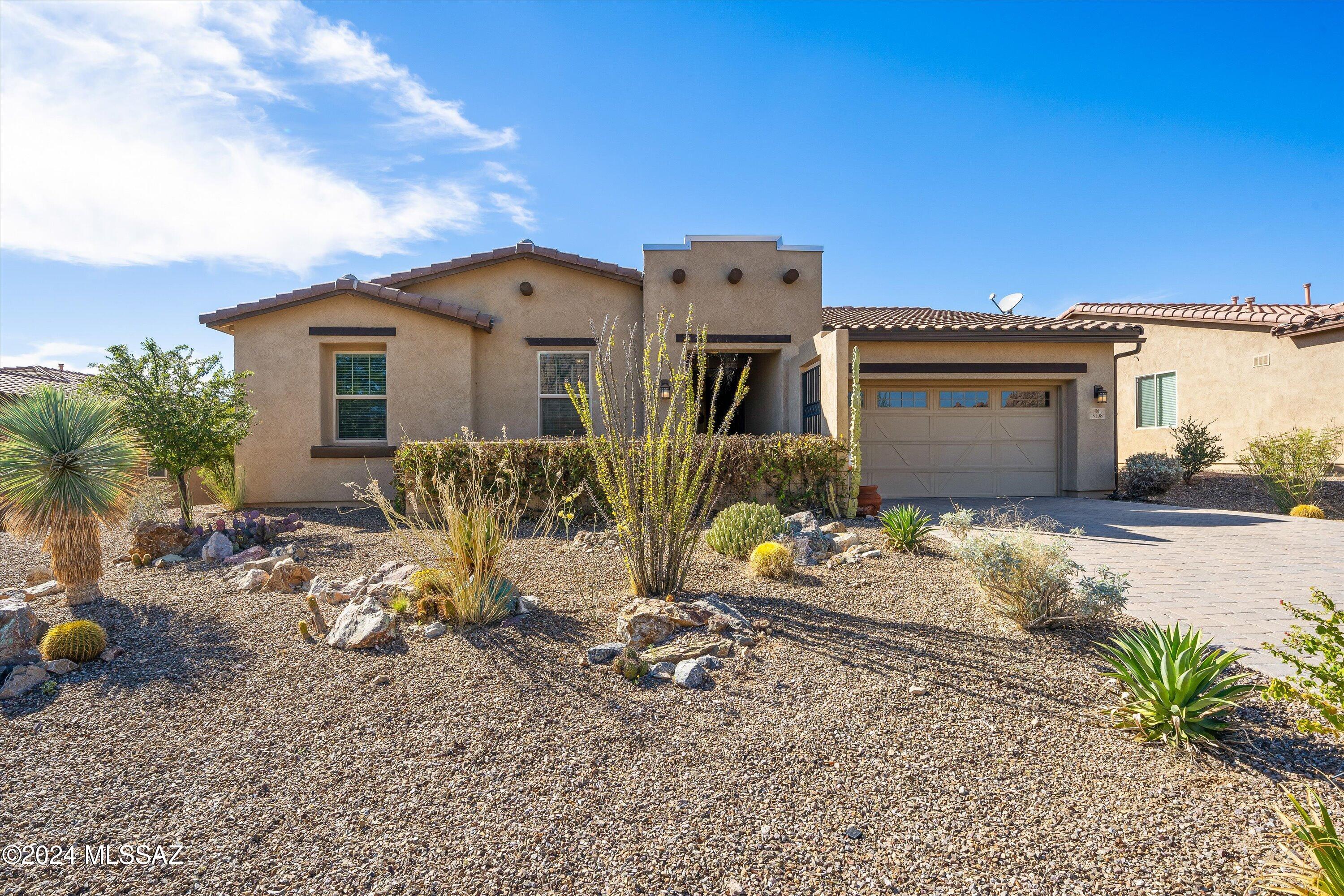 Outstanding westside neighborhood with wonderful views of the Tucson Mountain Peaks. Courtyard entry leads to open and bright floor plan. Kitchen with island, lots of cabinets, updated appliances, granite counters and wonderful tile backsplash. Spacious primary suite with bath and walk-in closet. Split plan with generous sized additional bedrooms. Powder room plus den/office. Tranquil covered rear patio overlooks peaceful landscaped yard. Inviting community pool and spa. Don't miss this wonderful neighborhood setting.