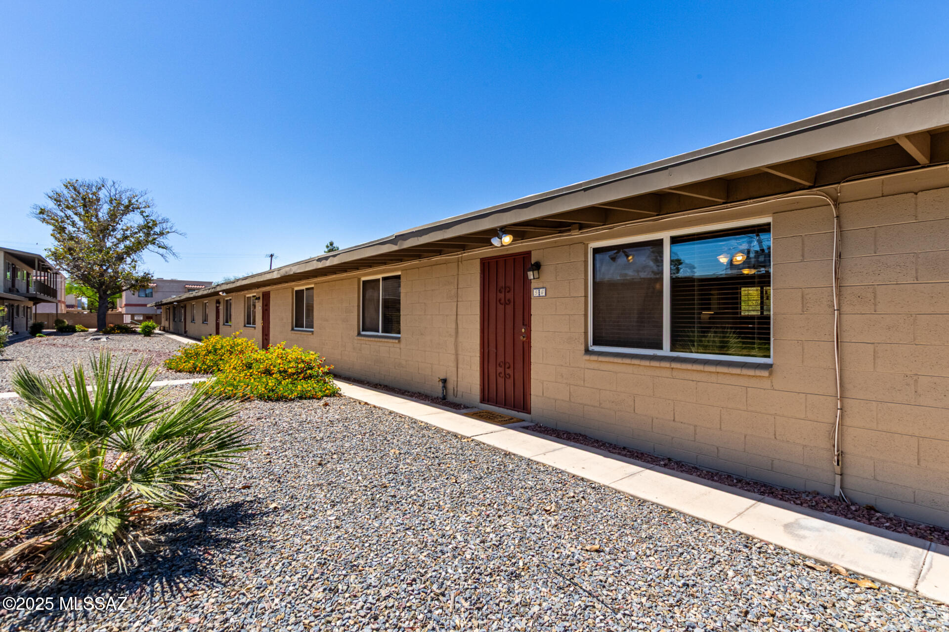Feels more like a home than a condo! Enjoy this one level home with direct, rear access from parking area. This homey 2 bedrooms + one full bath home is ideally located in the heart of Tucson close to UofA and all essential necessities of life. All appliances are included! The fridge and dishwasher are less than 2 yrs old and oven less than 6 months. Big perk...Your very own laundry/storage room located in the adorable, enclosed backyard area.  HOA amenities include: Pool, Water, trash, and exterior, front maintenance. Don't miss this opportunity to become a homeowner!