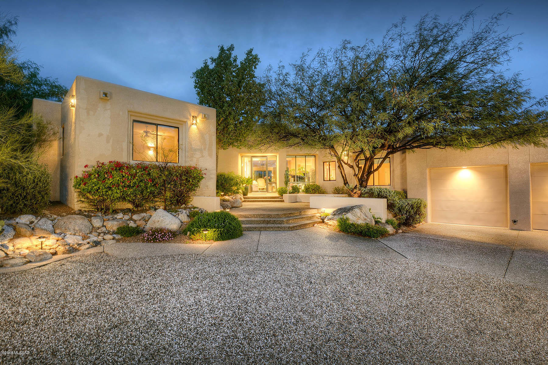 Stunning mountain, canyon & city views abound from this special custom home, featuring walls of windows, an excellent open floor plan that includes a great room concept PLUS elegant living & dining areas, tons of thoughtfully planned storage & everything impeccably maintained. Fabulous pool, gas fire pit & jacuzzi area were strategically designed for maximum enjoyment of the sweeping view corridor of this unique lot. Beautiful, easy care vegetation creates a quiet sanctuary, w/ plenty of room to entertain, plus a roof deck for more fun.  Extra room off the garage boasts a separate entrance & luxurious steam shower, perfect for guest quarters, exercise room, or home office.  New garage flooring, roof recently re-coated, & so much more.  See attached documents for list of add'l features!