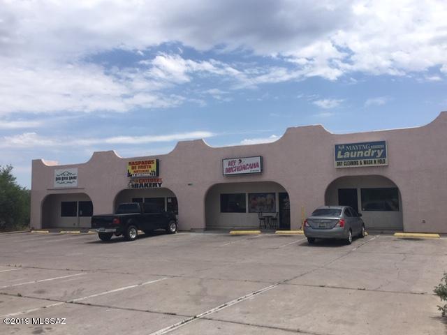 Nice Neighborhood strip center in heart of Rio Rico. Lots of potential for this retail center with 4 units approximately 1000 sq.ft. each. Center sits on 2 Commercial lots.  Great income property with several long time tenants. Laundry business included.