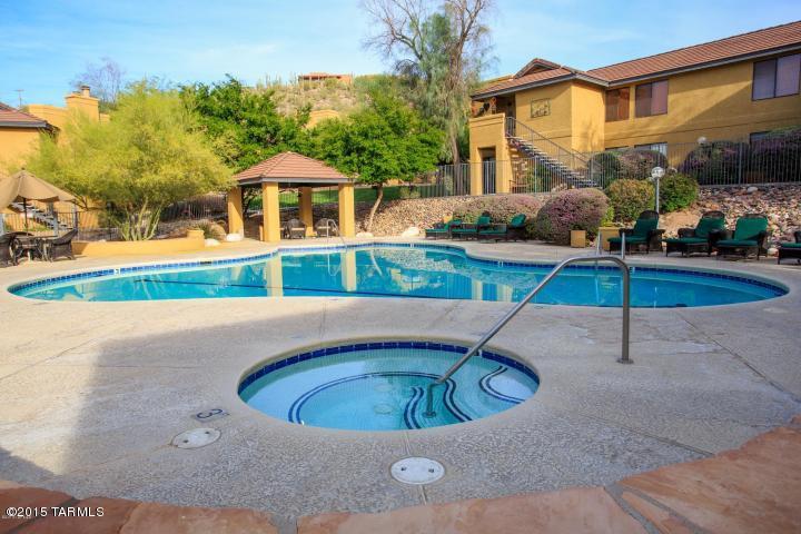 Spacious 2nd floor condo with Catalina Mountain views in the gated foothills community of Villas At Sabino Canyon.  This private remodeled condo features a kitchen with granite counters, newer cabinets & SS appliances, open split bedroom floor plan, covered East facing patio, washer/dryer in condo, master suite with walk-in closet and water, sewer & trash is all included with the rent.  The Villas At Sabino Canyon resort style amenities included heated pool & spa, exercise facility, gated entryway, district 16 schools and a convenient location near shopping & numerous restaurants.