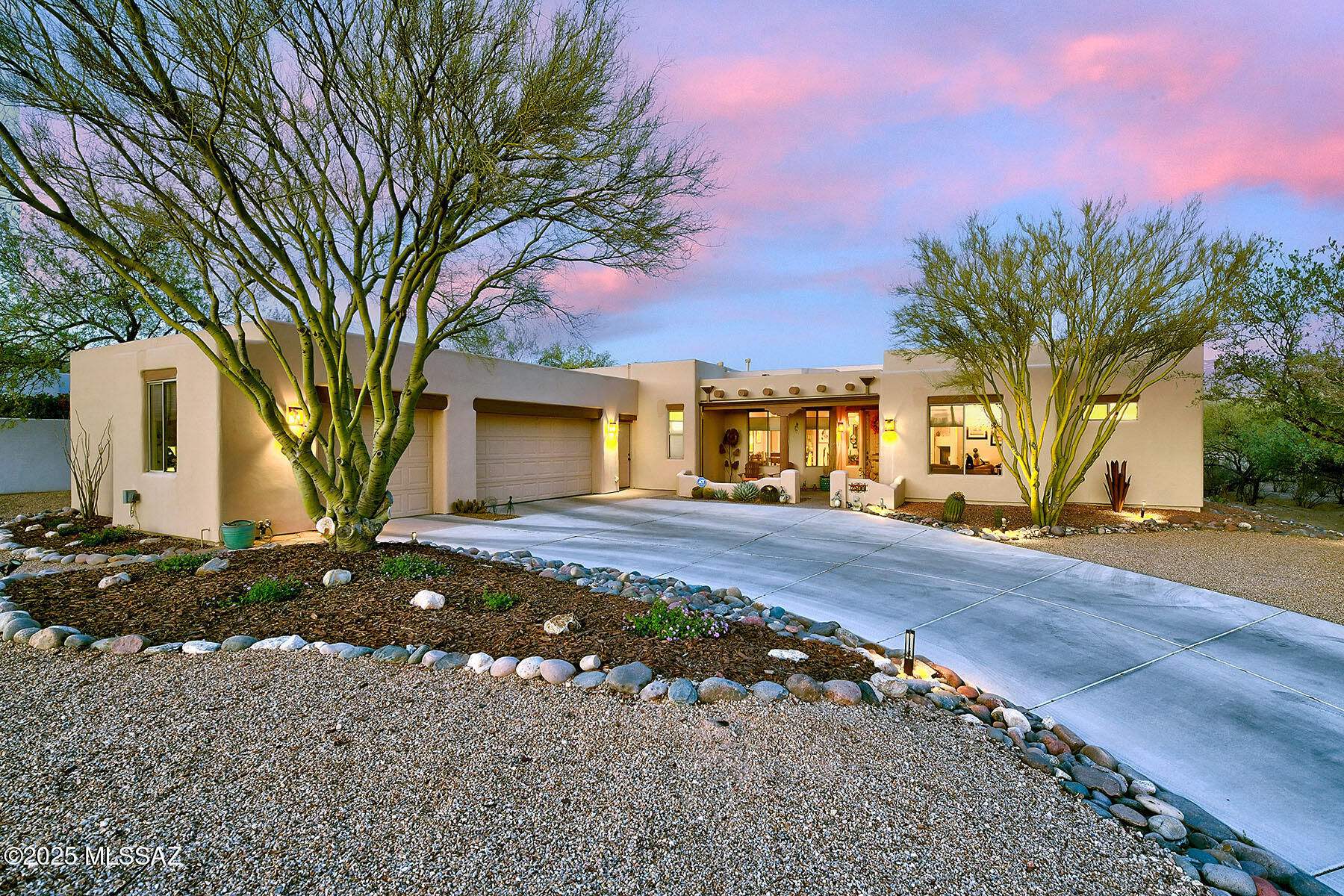 Beautiful custom residence situated in one of Tucson's most desirable areas. Exceptional blend of privacy, luxury, & convenience. Chef's kitchen has a designer's touch & features Viking gas range, elegant white cabinetry, &  quartz countertops w  views to the backyard &  family room. A luxurious primary  bath featuring dual vanities, jetted  tub,  exceptional spa -like shower,& a generous size walk-in closet. Expansive covered patio  capturing mountain & desert views,perfect for morning coffee or evening relaxation.Sparkling pool& spa offering the ultimate outdoor oasis. Landscaped low-maintenance backyard. Oversized 3-car garage w bonus workshop ideal for hobbies. Home has been lovingly cared for & shows in every detail. Tanque Verde Schools,close to 49ers CC, golf, hiking & trail riding