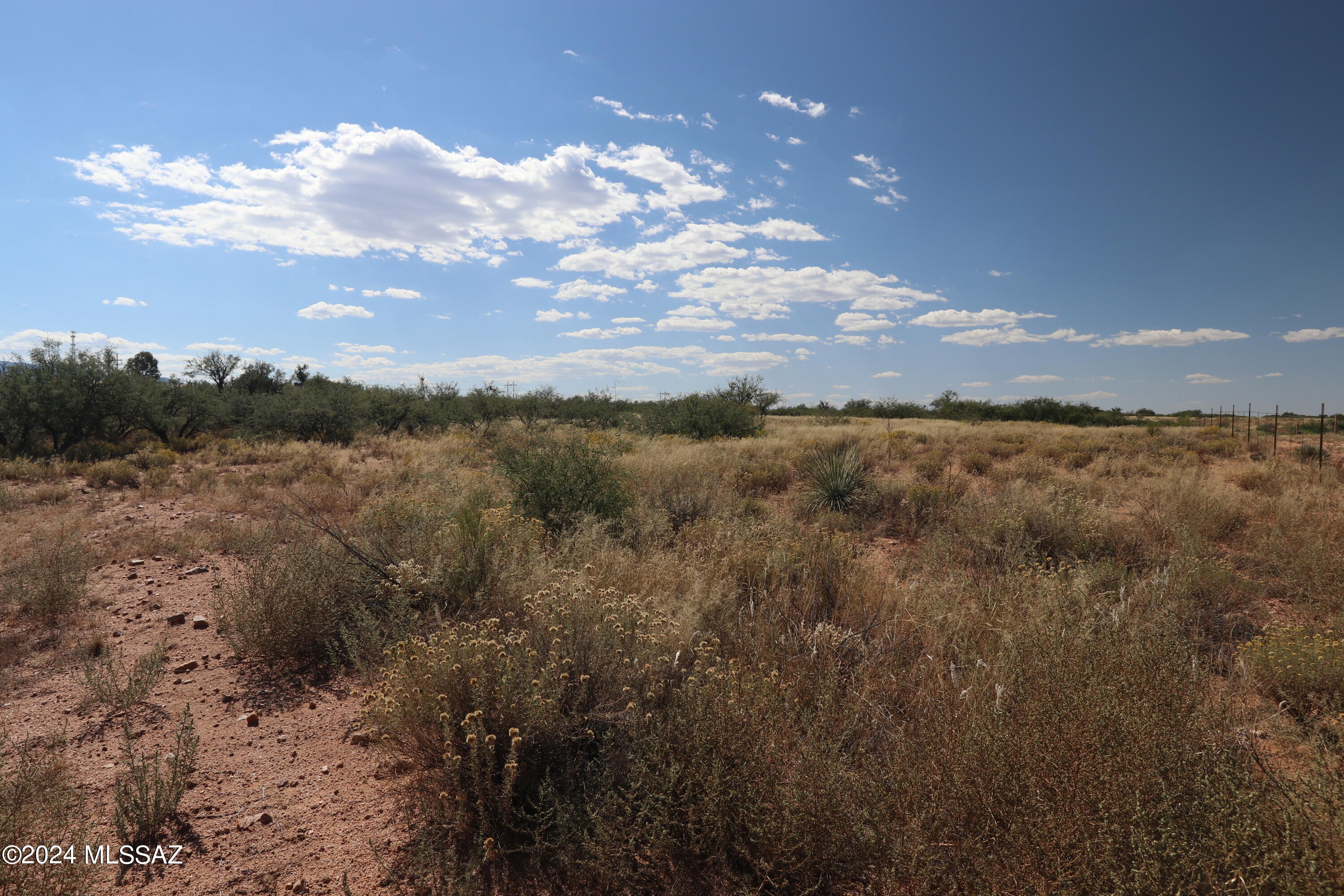 5 Acres in suburban Benson, AZ. Near I-10 and State 90.  20 minute drives to Tucson and Sierra Vista. Mild climate. Good schools.  Upscale neighborhood. Manufactured homes allowed. In Cochise County.