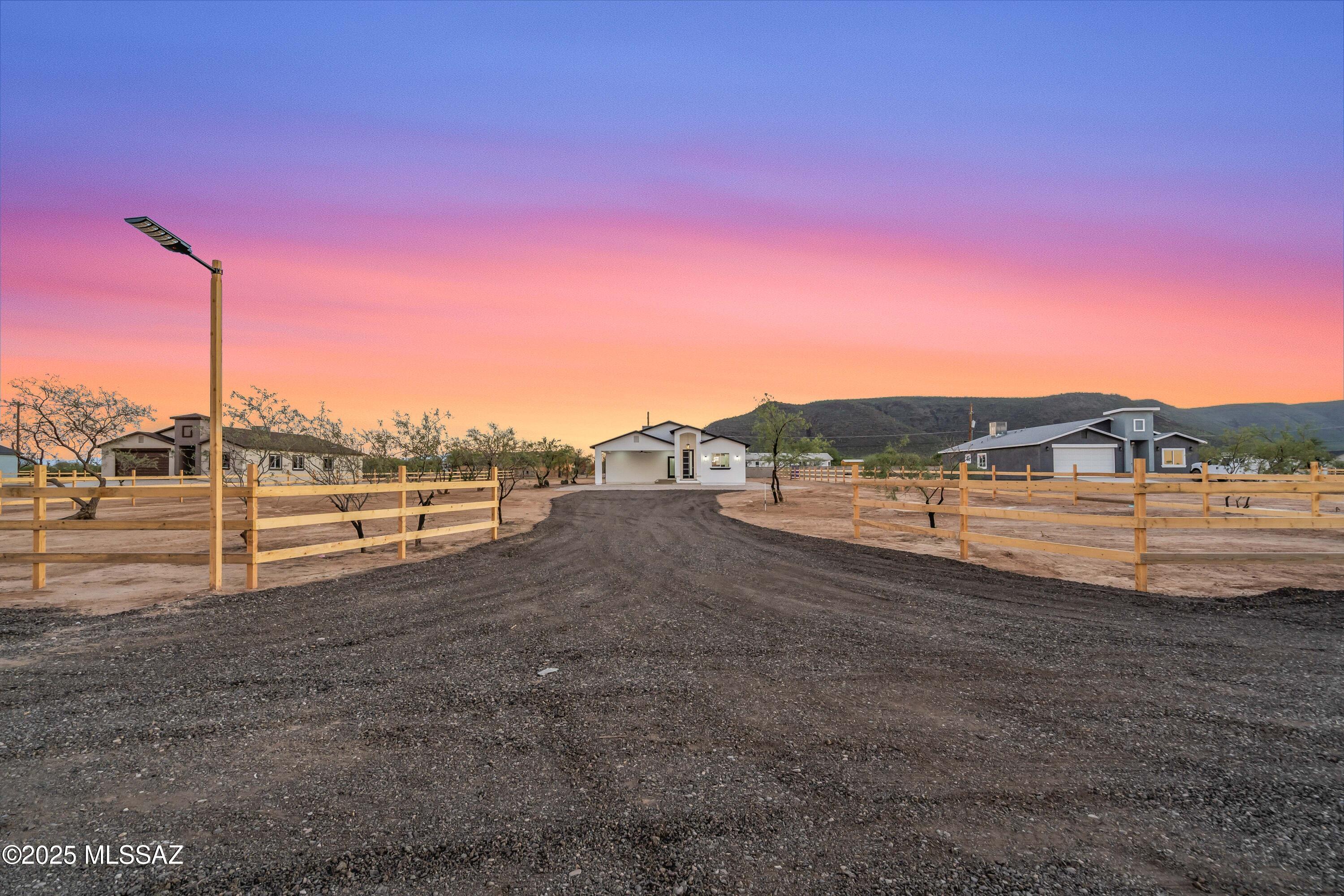 New Construction on a 1- Acre lot with NO HOA! Discover country living at its finest in this stunning new construction home. Nestled on a spacious 1 acre lot, this modern 3 bedroom, 2 bathroom home is designed for comfort and style. The open concept floor plan is perfect for entertaining, featuring upgraded cabinetry, elegant granite countertops, designer paint, and beautiful ceramic title throughout. Enjoy the serenity of the natural desert landscape while being just minutes from shopping, dinning, and more!