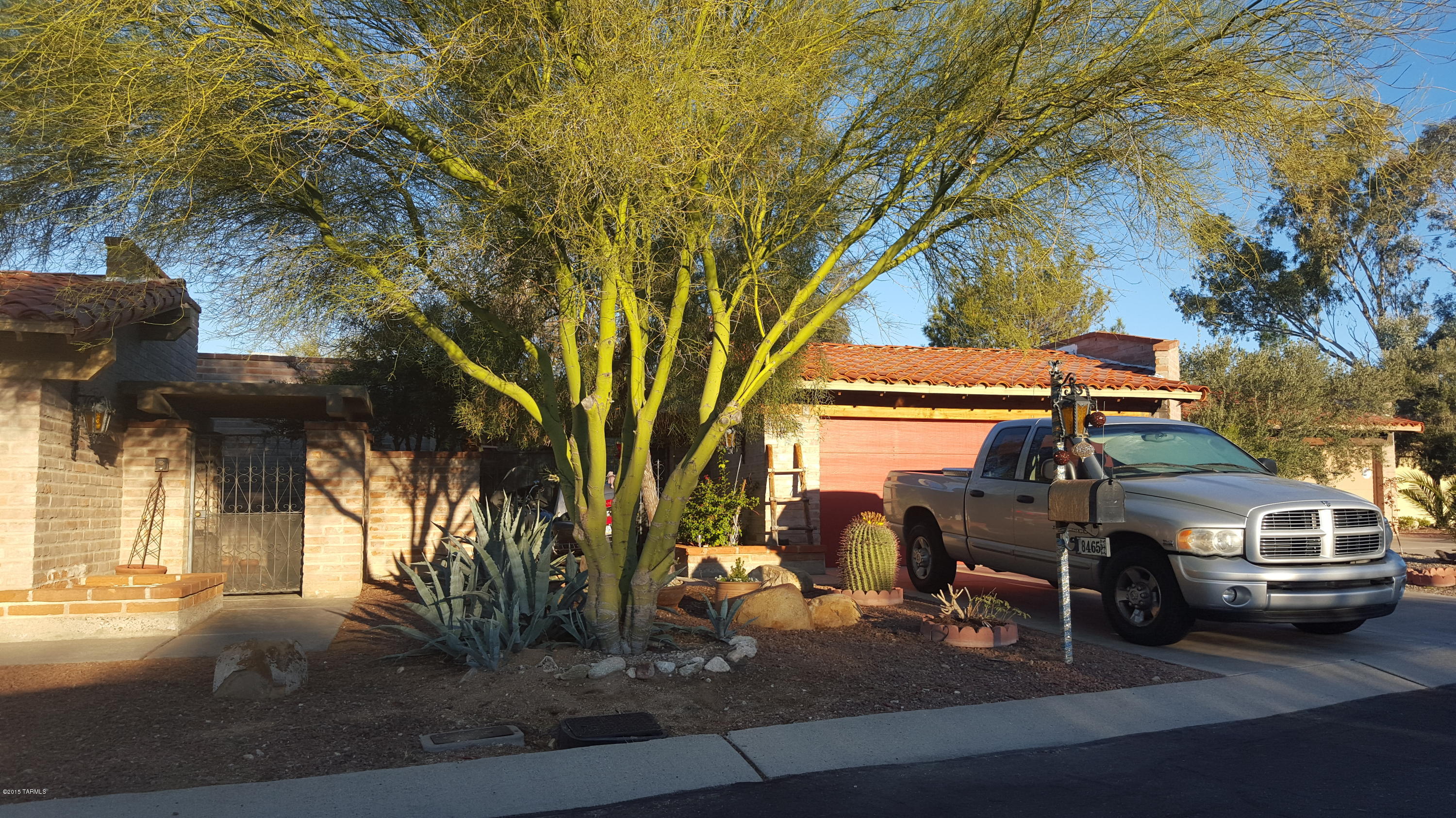 Wilford Construction Burnt Adobe- Outstanding Townhome with custom upgrades: expanded and remodeled Master Bath with extended Bonus Room off Master. Tile floors throughout. Rear Patio opens to common area- NOT back to back with another home. Exiting the rear yard gate will give you easy access to the community pool, tennis, and recreation area across the common area grounds. Large, tiled Great Room with Fireplace, two bedrooms, roomy garage, and very private front patio courtyard entry. Being sold ''AS-IS'' Short sale. Well-maintained home near Magee and Oracle Roads in Beautiful Oro Valley. Very rarely do we see homes come available in this great community.