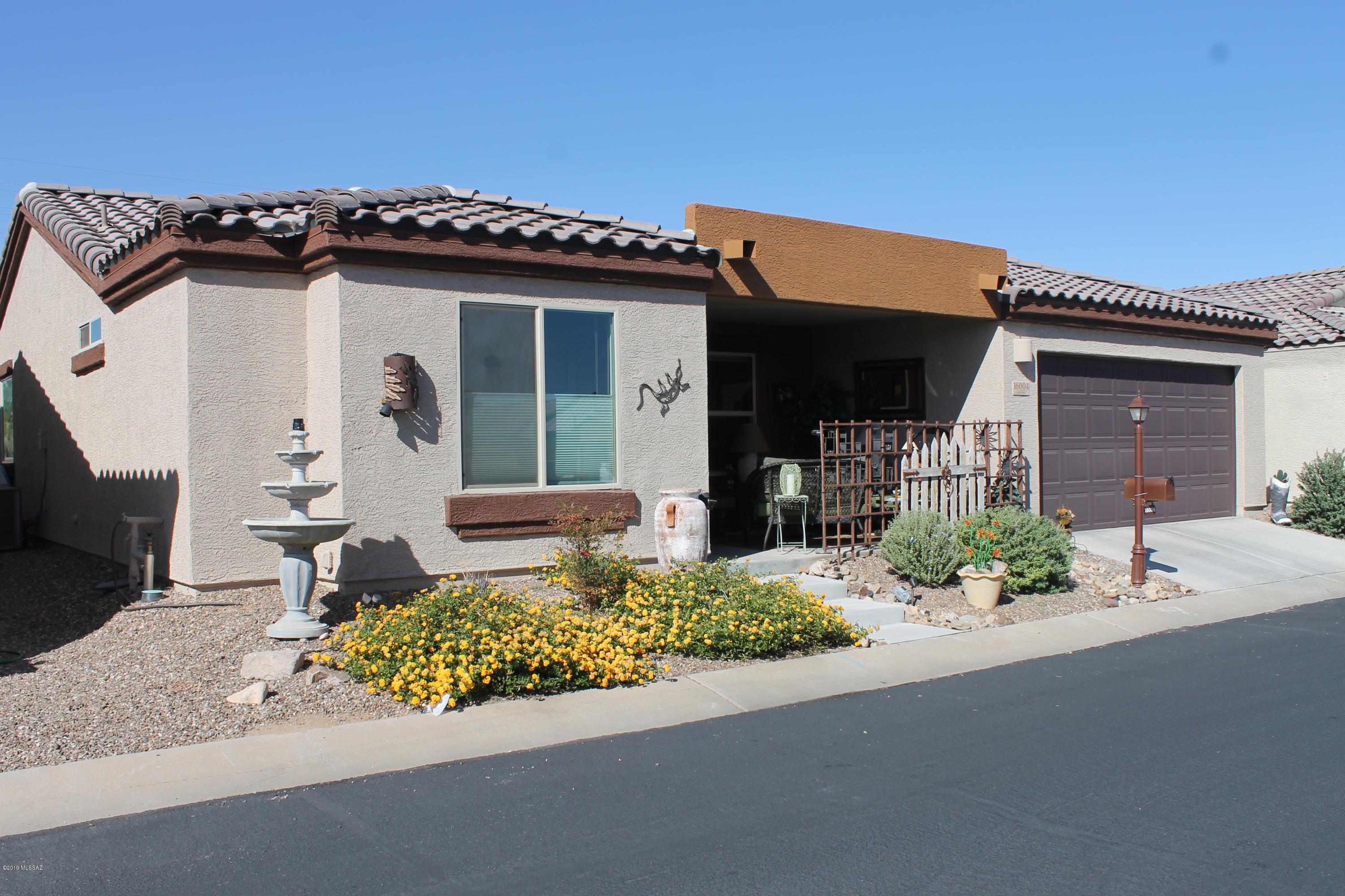 Perfect Winter Retreat-Furnished Vacation Rental Jan - Apr 2020! A gorgeous, 1388 sq ft home with 2bd/2ba/2-car garage, conveniently located in the gated, Active Adult Community of Rancho Resort in Sahuarita, AZ. It boasts a spacious open floor plan. Step inside to find a modern kitchen that opens to the dining room and great room. Granite countertops, upgraded cabinets, a pantry, breakfast bar & all appliances. RO water.The cozy great room is furnished for relaxation and includes an electric fireplace and entertainment center. Off the great room you find a comfy den, With a split floor-plan, the master and guest bedrooms are on opposite sides of the house.  Queen beds in master BR and guest BR. Ensuite bathrooms in both. Hurry! This rental won't last long.