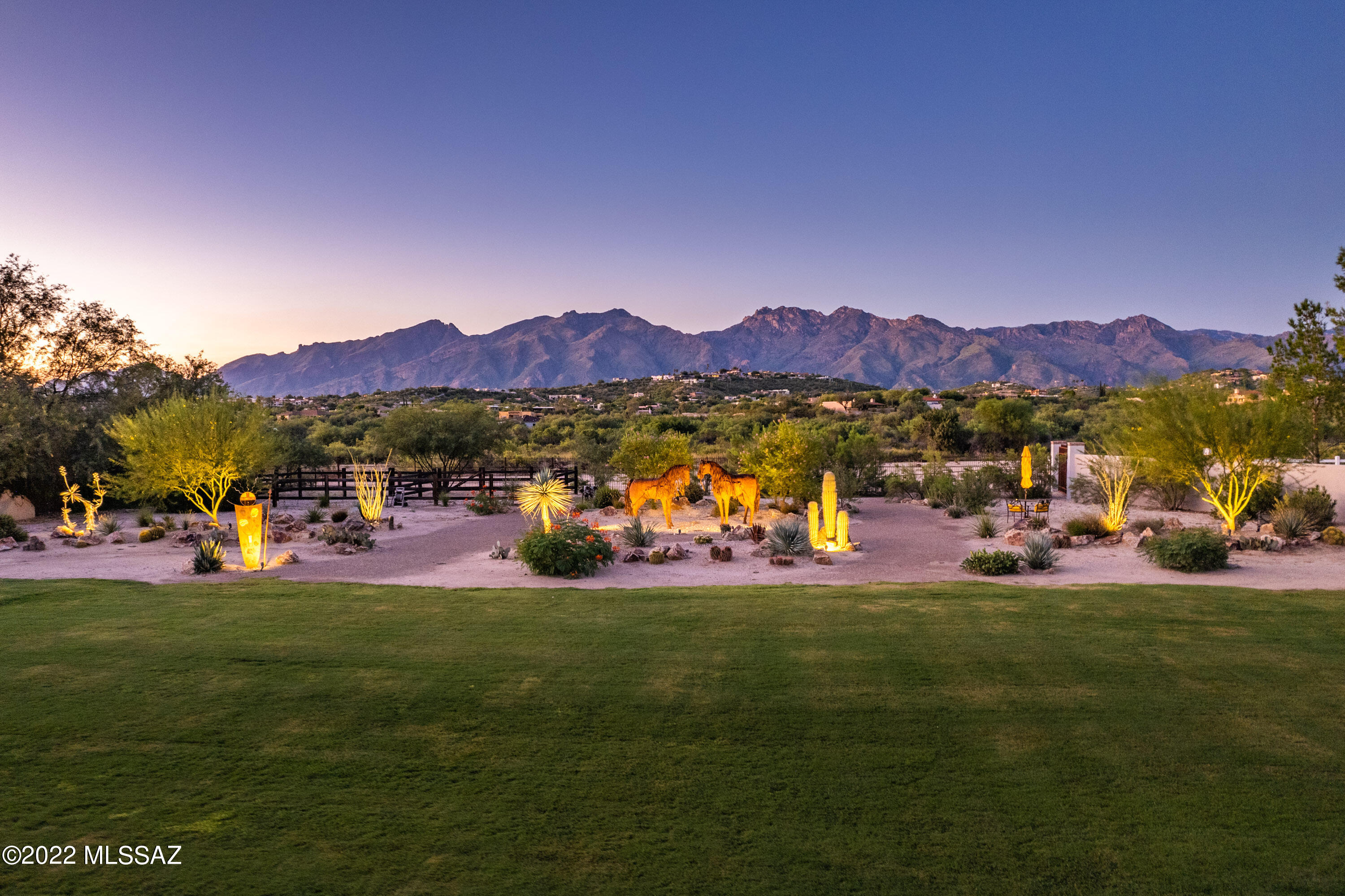 Quintessential Tucson! Absolutely STUNNING and completely updated burnt adobe Hacienda in guard-gated Tucson Country Club. Private 3.56 Acre estate with panoramic Catalina views! The 2018 Guest House (852 SF, 1BR/1BA) perfectly complements the GORGEOUSLY REMODELED 3,340 SF main house with charming courtyard, MAGNIFICENT KITCHEN & GREAT ROOM, 3 add'l Suites, den/office with wine refs, 2 Powder Rooms,3 Fpls, lovely covered veranda and simply gorgeous yard. Private 2009 well serves entire estate (access to both city and reclaimed water available). Amazing concrete floors, beautiful wood doors, Brazilian walnut & quartz counters, Viking & Sub-Zero appls, 3 sets W/D, large paver driveway, finished 3-car garage (2+1), pool, fabulous landscaping, small corral. Nothing to do but move in and ENJOY!