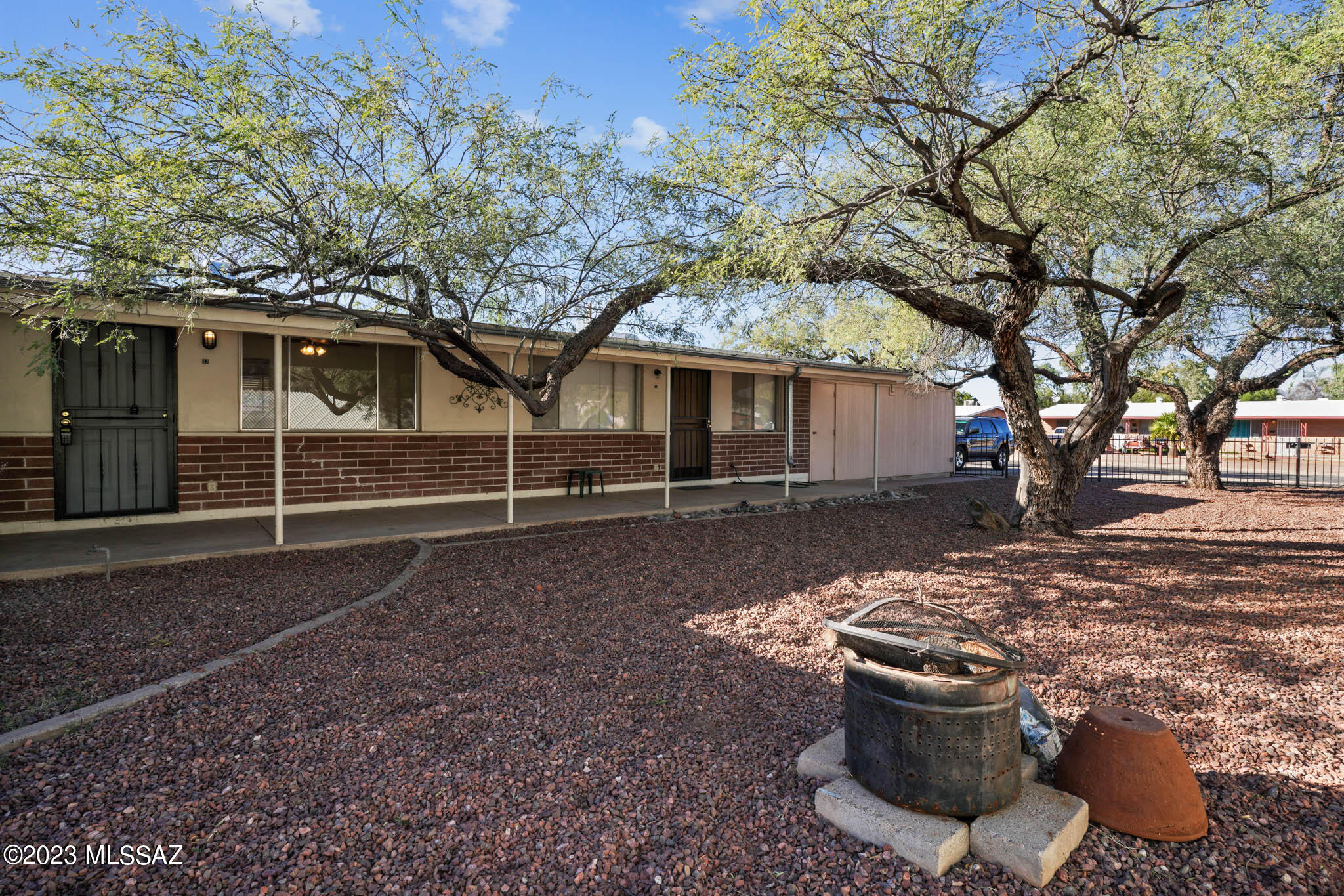 Welcome to this charming triplex. This property has two 1-bed, 1-bath units and one 2-bed, 1-bath unit with a private pool. The kitchens feature stainless steel appliances and brand new countertops with plenty of counter space.  All three units are well maintained and updated. Outside, the property features a lovely low-maintenance landscaped yard, two garage spaces, and additional parking, ensuring that tenants always have a place to park. Don't miss out on the opportunity to own this fantastic property!
