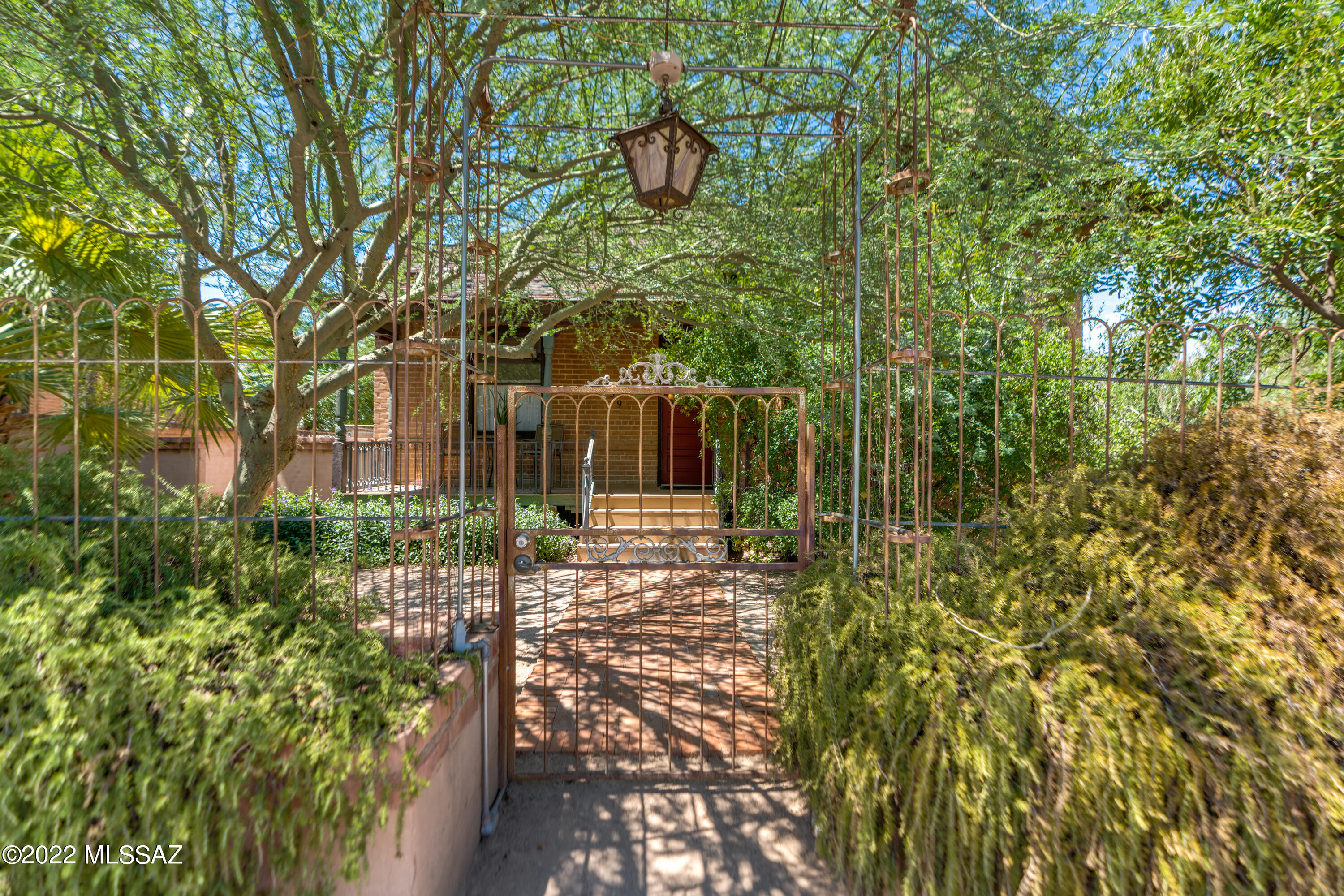 SELLER OFFERING BUYER UP TO $15K IN CREDIT TO BUYER CHOICE. This home is ready and waiting for you! Located in the Historic West University community, you will never miss out on anything! Close to Downtown Tucson, Main Gate Square, U of A and quick access to I-10, you can be anywhere in the greater Tucson area within 30 minutes. This unique home built in the early 1900's is a gem. Front house boast: 2 bed, 2.25 baths, high ceilings, wood flooring, natural light and amazing space perfect for entertaining. The Casitas are both 1 bed 1 bath with private patio and shared laundry. In the center of it all...you get a peaceful, serene common space with a relaxing pool and plenty of shade to enjoy those warm days. This home has been meticulously maintained for over 30 years by one owner.