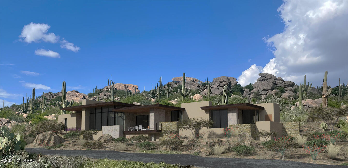 Live the best of both worlds with your single-story, 3,750 sq. ft. luxury home nestled among nearly two acres of desert scenery, rock outcroppings, and ancient saguaros in Stone Canyon. Designed to merge the functionality of indoor living with the beauty of outdoor living, this one-of-a-kind home offers a seamless, cohesive space for entertaining. Not only does the inside of this home accommodate three bedrooms, an office/den, an open great room, kitchen, dining, and bar area, but the indoor outdoor living will give you a personal retreat right in your backyard. luxuries afford a quick getaway without leaving home! The optional casita may also be configured as an office, guest casita, art studio, or more the choice is yours.

This home lives serenely and majestically within the private, gated community of Stone Canyon. In a quick 5-minute drive, find yourself at one of the top 100 golf courses in America highlighted by its designer, world-renowned golfer Jay Morrish. Accompanied by a luxurious Health and Fitness center and a modern restaurant, Stone Canyon leaves no stone unturned in providing you with all the comforts one could desire. Call this breathtaking gem of a home in Stone Canyon yours!
