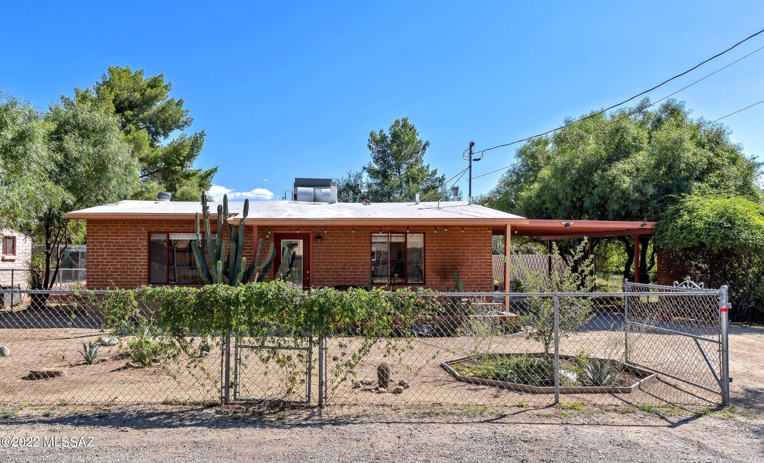 Charming Mid-Century Red Brick Central home and Large Guest house. Main house is 2 Bdrm, 1 full bath. Guest house Studio featuring a large oversized  kitchen, custom cabinets, New Roof & 6 New Skylights, Large Walk in Shower,  Plenty of Charm and Space.  Many options: air-bnb, yoga, entertainment, office, rental, etc. Many Features includes a Large Parcel, No HOA! Near end of road so low traffic.  Private backyard Oasis, enjoy the evening around a Fire Pit,  Native Landscaping, Mature trees, a Night Cereus of many flower blooms, Heirloom Historic Tombstone Rose Tree over 50 years old.  Upgraded Tough Shed with Solar, Insulated,  Transom Windows, etc. used as wood shop. Close to bus line every 1/2 hour, Rillito River Path, 136 mile path, Stores, The Love of Tucson is right here. New shingled roof and skylights on guest house.
Updated kitchen in the Red Brick home, all LED lighting throughout, New flooring, Granite Counter tops, updated bathrooms.
Guest house newer Mini split,