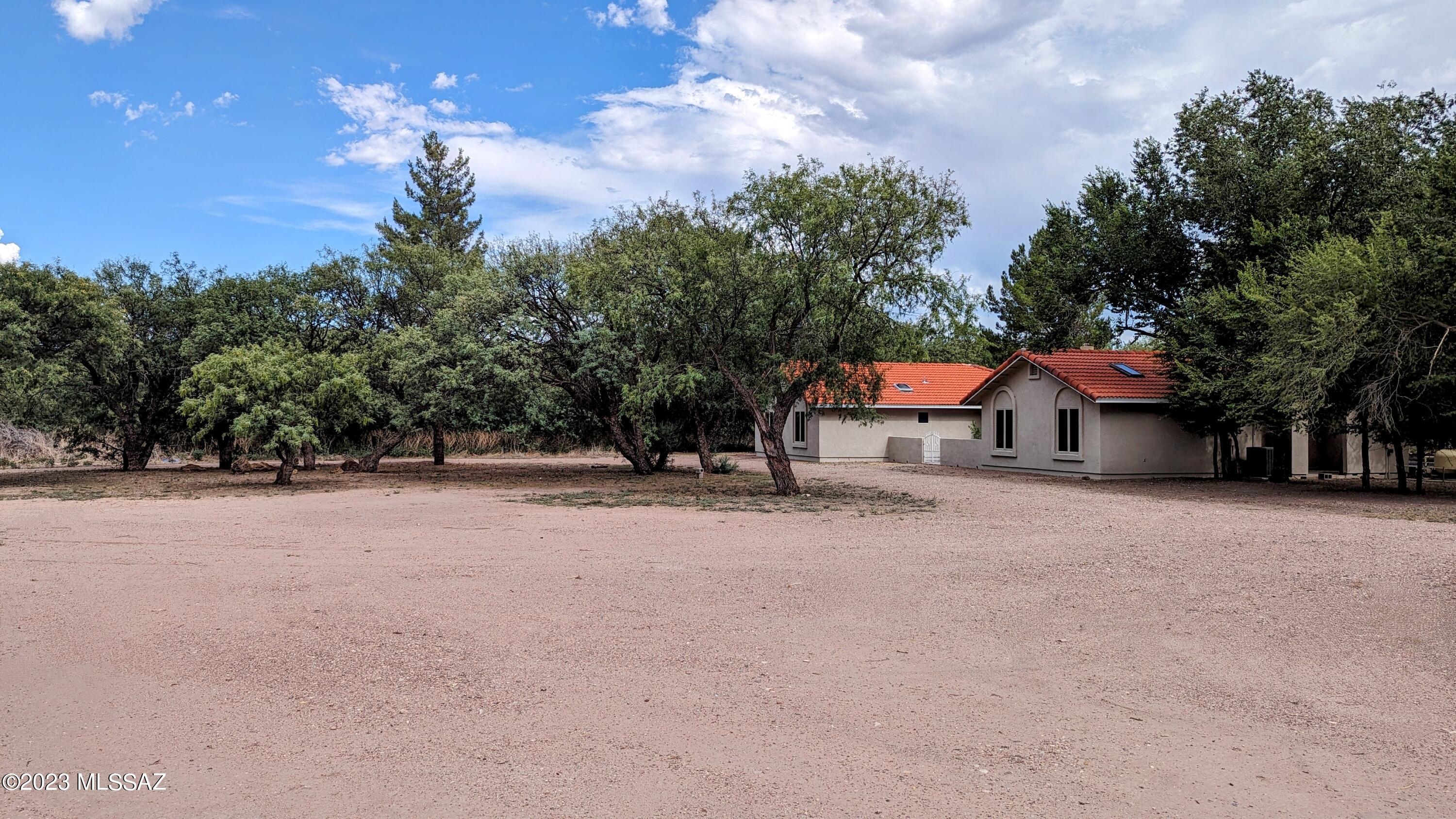 🌵Step into a hidden sanctuary where the desert meets unexpected luxury. This 5-bedroom, 3-bath retreat spans 20 lush acres, offering a scene rarely found in Arizona—towering trees, wildlife and so much more.

For those who need space, this property delivers: a massive 6+ car garage, a hay barn, a refreshing pool, and a private well for sustainable living. Whether you envision a thriving Airbnb, an organic farm, or your own secluded escape, this property is the ultimate canvas.

✨ Unique. Spacious. Irreplaceable. Don't miss this chance to own a one-of-a-kind desert paradise. Schedule your private tour today!