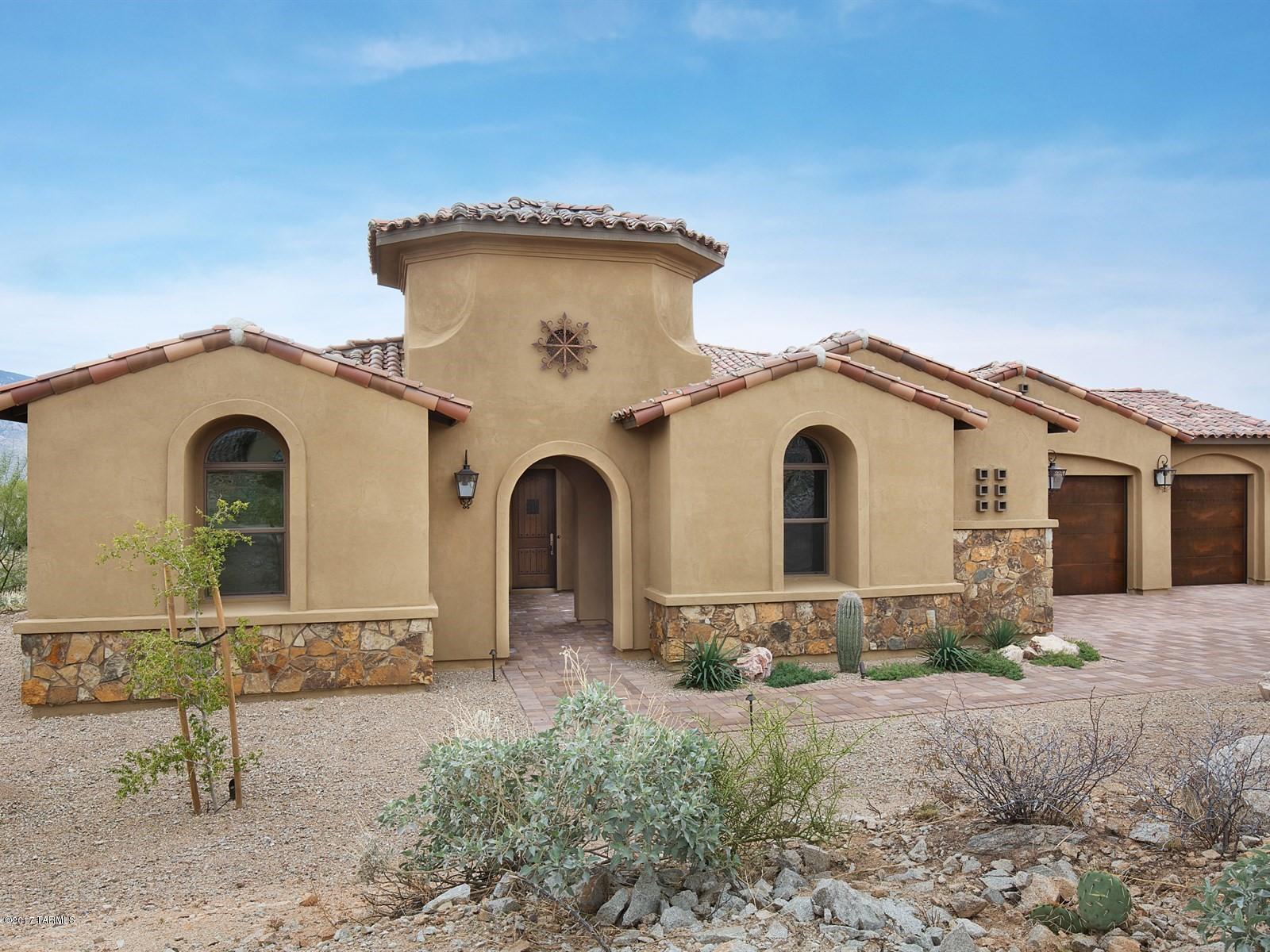 Brand NEW Energy-Efficient home ready NOW! Enjoy panoramic Mountain & City views, surrounded by the Sonoran desert common area!  Stunning Acacia with Mediterranean exterior, solid Alder stained doors, Bonus room & 4-car garage features gourmet kitchen with enormous center island, walk in pantry and gleaming granite counter-tops. Luxurious Master suite has luxurious spa like bath with his & hers vanities, soaking tub, shower & huge walk-in closet. Enjoy outdoor living in your private courtyard or on your covered back patio with Seville Pima pavers. Love living in the gated community of Stone Gate at Stone Canyon with the beautiful golf course. Known for their energy efficient features, our homes help you live a healthier & quieter lifestyle while saving you thousands on your utility bills.