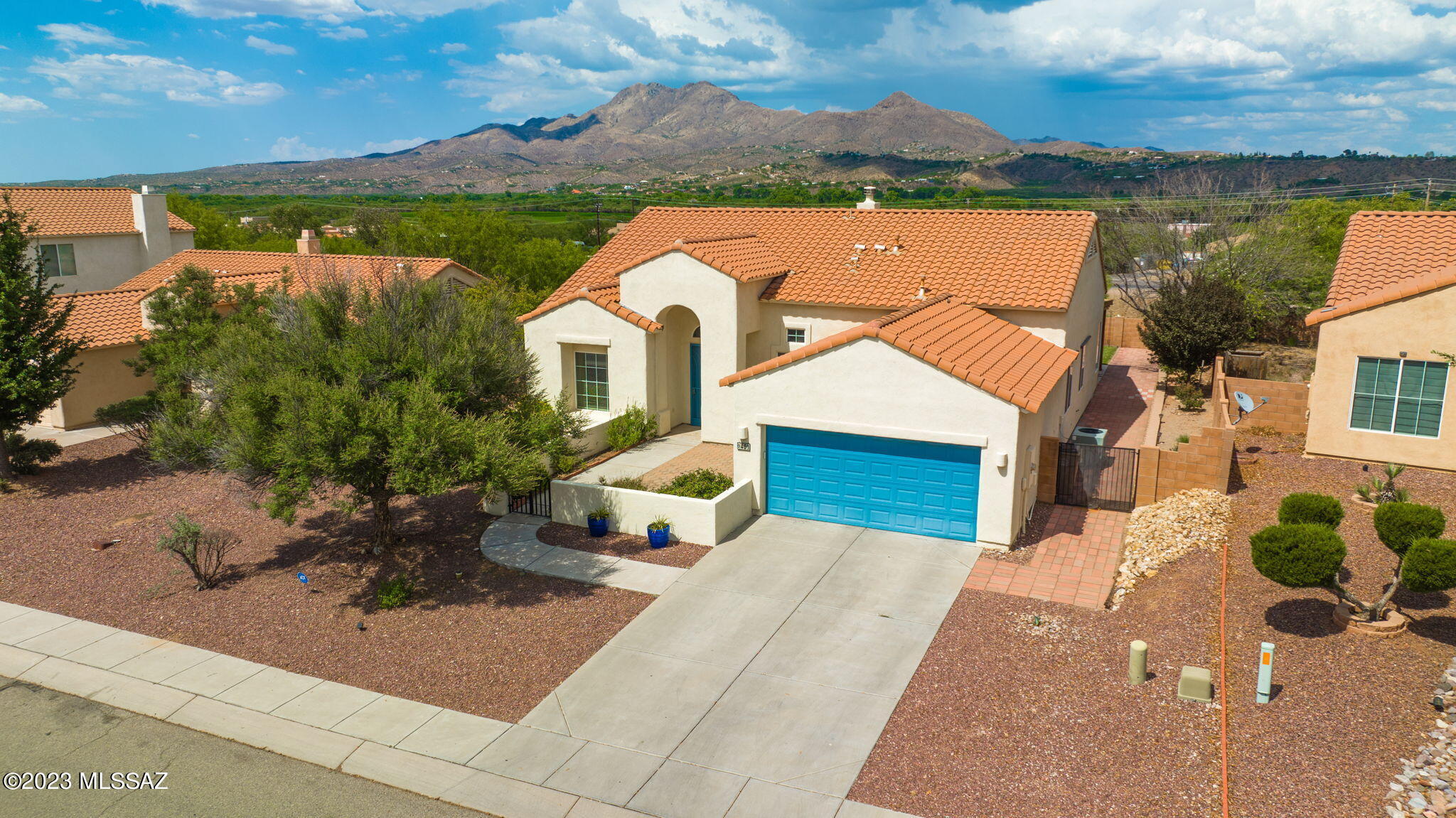 Immaculate home located in the desired neighborhood of Bella Vista North. This property features an open concept floor plan in the living, dining, and kitchen area. With unobstructed backyard views of the San Cayetano Mountains and fully covered patio, perfect for those who want to enjoy the peaceful sunrise. The kitchen has plenty of cabinet space, with granite countertops, under cabinet lighting, stainless steel appliances, and pantry. The gas/wood burning fireplace is perfect for those cold winter days with the family, or while you dine, or even cook. As you walk towards the bedrooms you will see the spacious Primary with large windows, and a spotless bathroom. This home is move in ready and a prime example of a place maintained with pride of ownership.