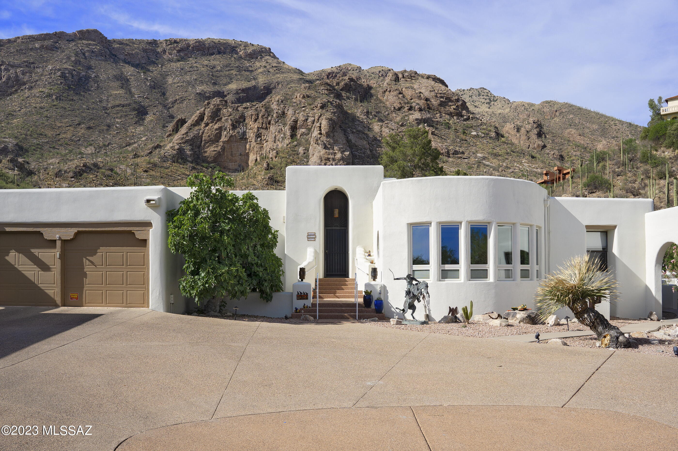 What a transformation!  Taking the good bones of a long neglected property and creating a tranquil home.  The character throughout - wood floors in a rustic. style, kiva fireplaces, expansive primary suite with office and updated bath (even plumbed for a tub), split floorplan.  Oasis pool area (also redone) with solar heat and those views!  The grilling station is every chef's dream and just off the remodeled kitchen (french doors added) for easy access.  The detached casita, just steps from the pool, perfect for guests, a studio or...
