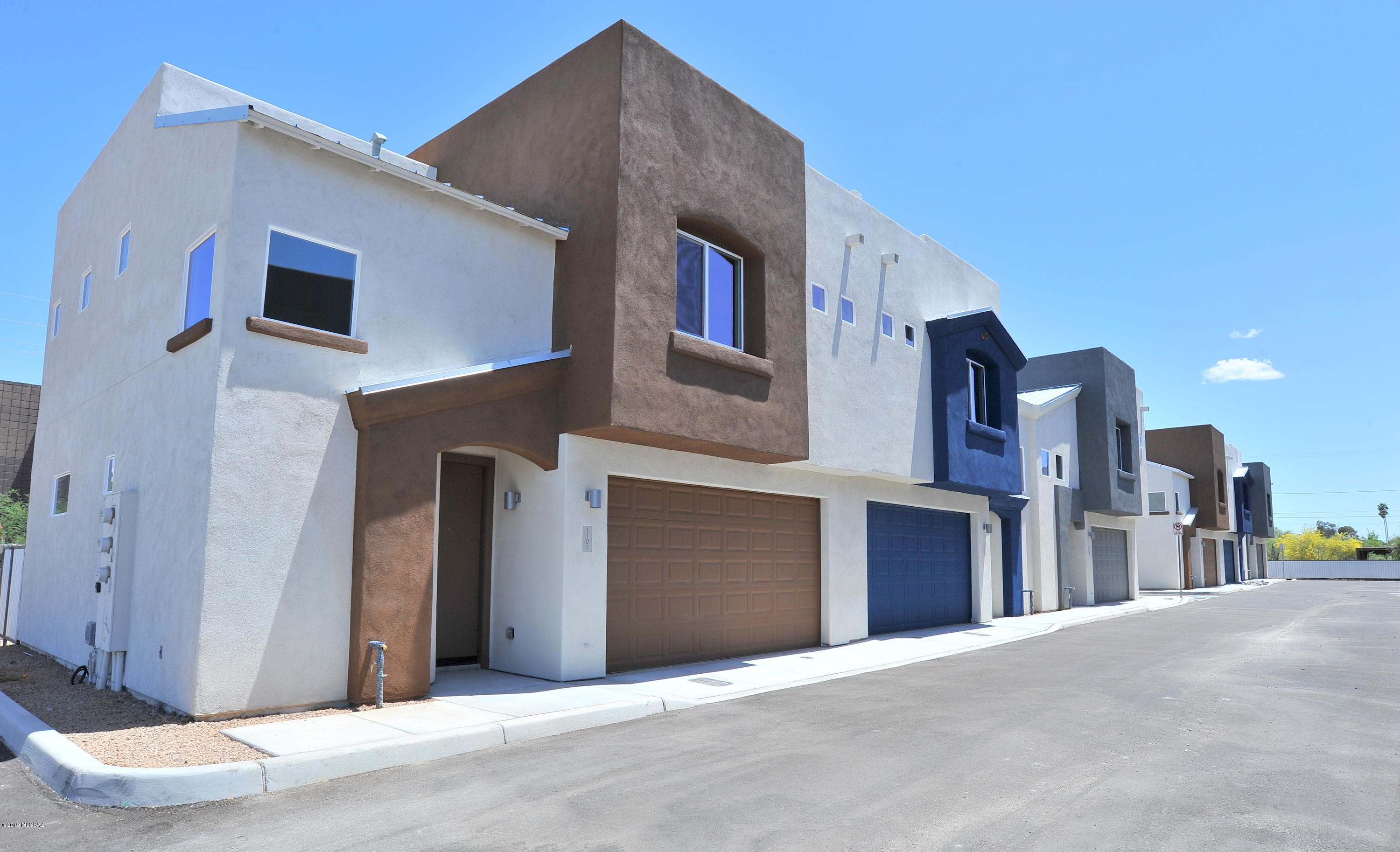 Brand New Condo community consisting of 13 3-bed/3-bath Units in Central Tucson. Next to The UofA campus and would be perfect for student housing. All units will have granite countertops and stainless steel appliances, covered patios and 2 car garages, Laundry area in each unit. Separately metered utilities. Compare other New construction apartment rents which are selling out at twice as  higher rents than on this pro forma. Easy to rent. Student housing rents per bedroom. Please call listing agents to view since under construction. Completion is estimated in FEB. Bring your 1031 exchange. Best opportunity in Tucson for this price. Interior Pictures shown are not of the completed project but are an indication of the finishes. New pictures will be uploaded once complete.