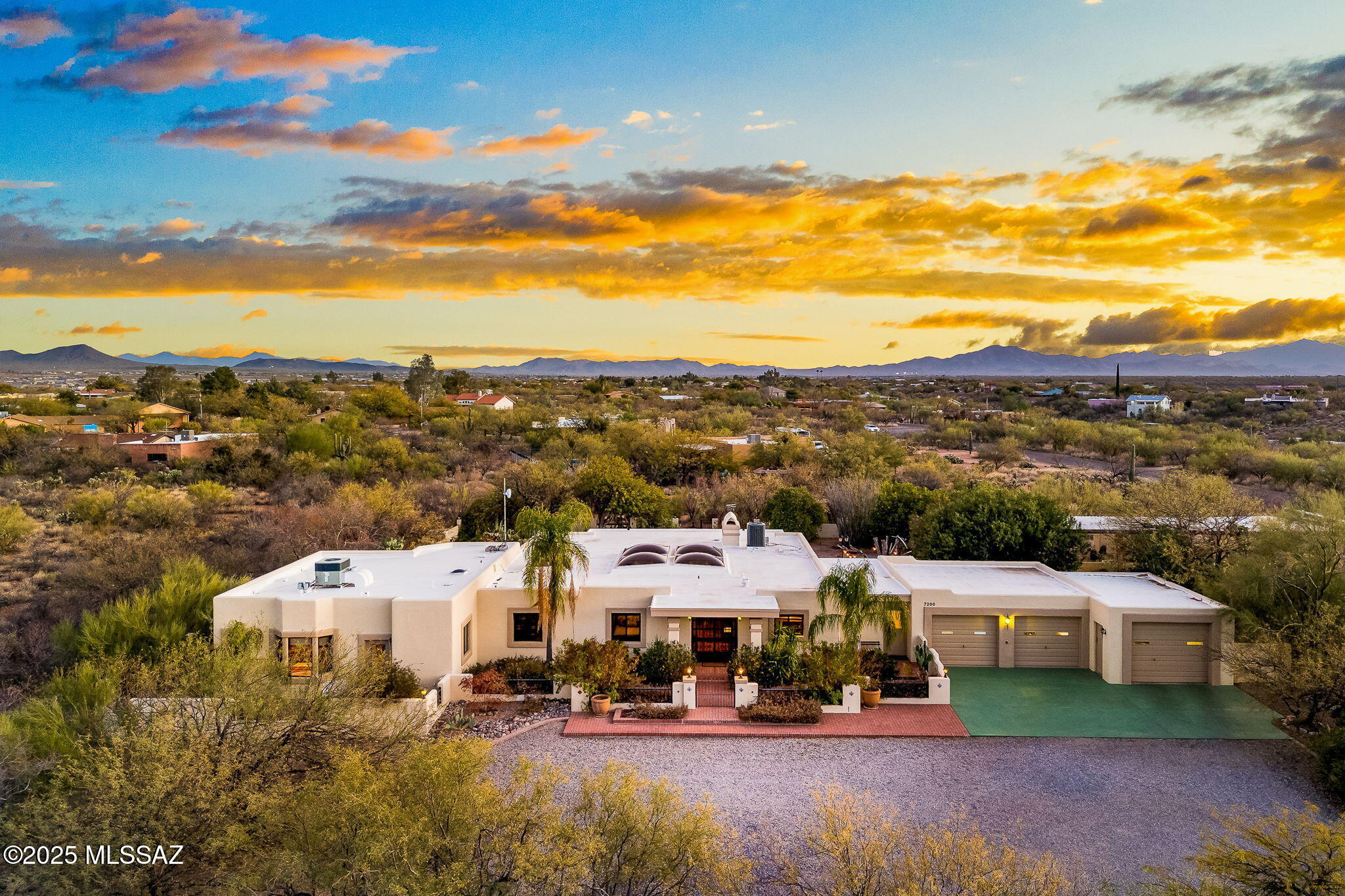 Range Priced-Seller will accept/or counter offers b/w $975,000 &/or $1,050,000. Nestled amidst the lush tranquility of 4 acres, this exquisite property offers a rare blend of luxury, privacy, and security. Imagine beginning each morning with the serene whispers of nature and ending the day with beautiful sunsets. This isn't just a home; it's a sanctuary. Every square foot of the exceptional layout is designed with quality and comfort in mind, ensuring an extraordinary living experience. The expansive windows bathe the interior with natural light but also offer you an uninterrupted view of the Rincon Mountains - the last untouched 'sky-island' in Southern Arizona. For the equestrian enthusiast, the property boasts horse stables that promise adventure at a moment's notice. 7200 S Camino Mirlo, Tucson, AZ 85747
     Features & Attributes:
"	Luxury and quality home with exceptional floor layout. Primary bedroom faces East: meaning that this living space will not get the impact of the warming day; garage faces West)
"	3,921 sq ft, single family home with 3 car garage & 1 carport (can be used for RV, boats, recreational vehicles-size is 13 ft high, 17 ft wide, 43 ft deep)
"	4.01 acres in the lush desert foothills of the Rincon Mountains--provides privacy but security as well 
"	Swimming pool with fenced-in surrounding to offer added protection (necessary for insurance purposes)
"	2 Stall Horse stables with corral and tack room
"	Greenhouse
"	4½ miles from supermarket (largest Fry's in Tucson) and general shopping center (Home Depot, Walmart, BofA, Rancho Rústico, ACE Hardware, Dentists, Pet Hospitals, Dermatology, etc.)
"	Located a short distance (7 miles) from three main hospitals (Northwest Medical and TMC) plus Care Centers
"	Situated 18 minutes to Tucson International Airport (newly built Valencia extension)
"	Surrounded by natural beauty (Rincon Mountain Range, Saguaro National Forest East), privacy, and security (not only situated in a safe area, but property also has a long driveway)
"	Top rated schools in Vail School District (Mica Mountain High School 4.7/5 Mi; Empire High School 4.2/5 Mi; Vail Academy and High School 4/5 Mi)
"	Scenic views of the Rincon Mountains, the last roadless 'sky-island' mountain range in Southern Arizona
"	8 minutes from Saguaro National Park East wilderness area (hiking trails, nature watch, Pic-Nick setting, camping)
"	Horse ranch locations close by (The Rocking Star Ranch, Saguaro Stables, Medella Vina Ranch)
"	No HOA
"	Saltillo tile, wood beams, brick and a living room of skylights with a live atrium in the entrance. 
"	The kitchen boasts real wood cabinetry, dual ovens, and an executive refrigerator with a pantry room. 
"	Enjoy the bar room equipped with a full fridge, bar for barstools and a TV mount. 
"	The primary suite has a spare room off of it that can be used however desired. The primary bathroom has been beautifully upgraded with southwestern touches, a jetted tub, and separate shower, and a custom walk-in closet. 
"	Bedroom 2 is also an en suite bedroom with a separate bathroom. 
"	The backyard has a bbq area, a zen garden area, and the pool has a serene water feature with beautiful lush landscaping and vegetation. 
"	For the equestrian enthusiast, the property boasts Block and Stucco horse facilities, tack room with 2 stalls, and full electricity/ water with a Riding corral and washing area. Enjoy riding right out from your own property!  
"	This is more than a home; it's a lifestyle.  A lifestyle that balances the peace of the countryside with the pulse of the city.  A lifestyle that caters to both the solitude seeker and the social butterfly.  Don't miss the opportunity to own this slice of paradise, where every day feels like a retreat into nature's embrace.