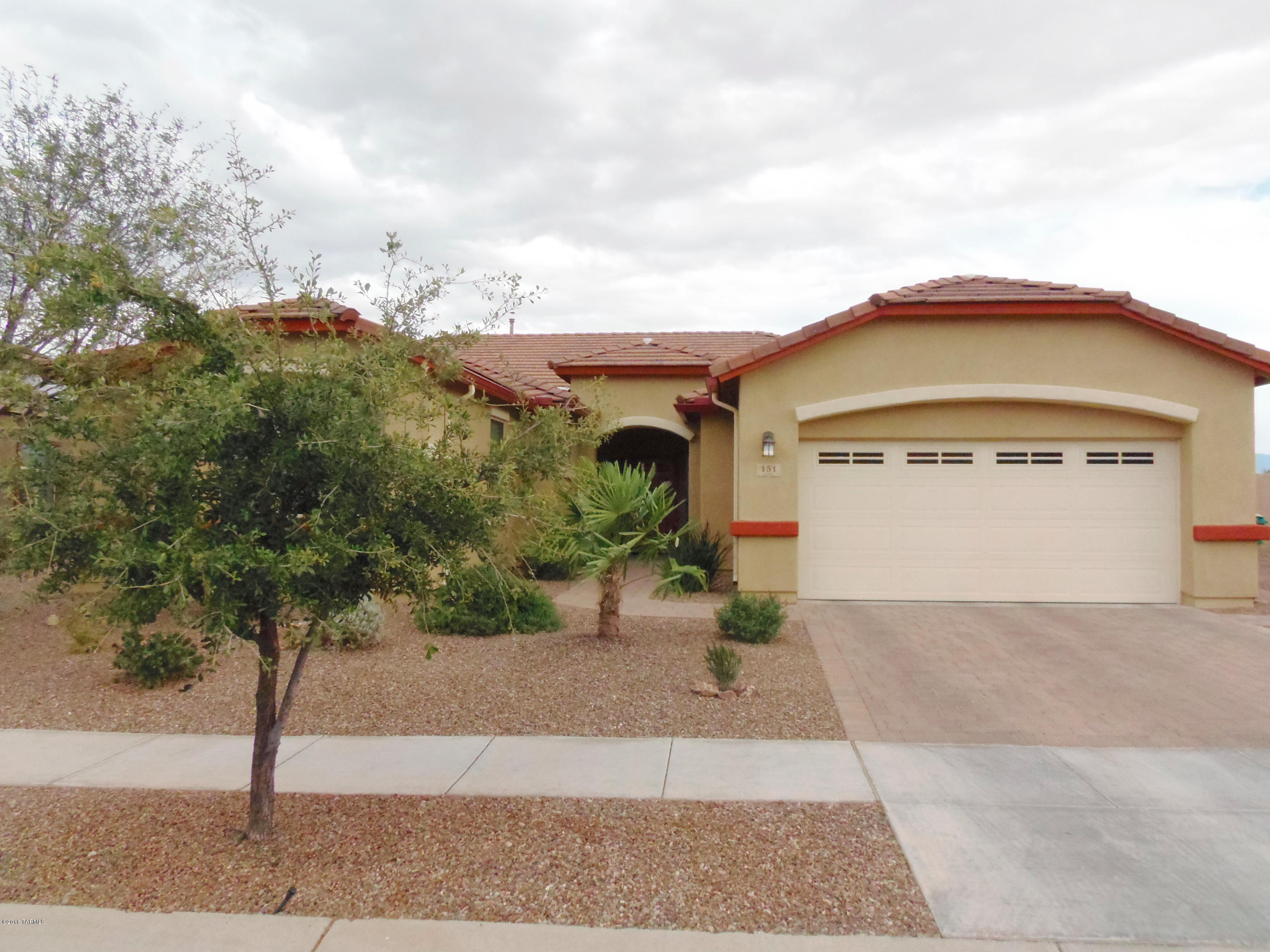 Like new home in gated Estancia Del Corazon.Immaculate&very lightly used.3 bedrooms,2full baths & den.Split floor planw/private owner's suite.Large covered&extended Belgards paver patio.Fully landscaped front&back w/irrigation.Nearly 1/4acre lot w/no rear neighbors,green space & stunning views of 2 mountain ranges.Kitchen has large cook's island&granite counters.Upgrades include double cell Levolor blinds. Gutters&down spouts installed. Walking distance to schools, club house & dog park. Enjoy all of the Rancho Sahuarita Amenities!