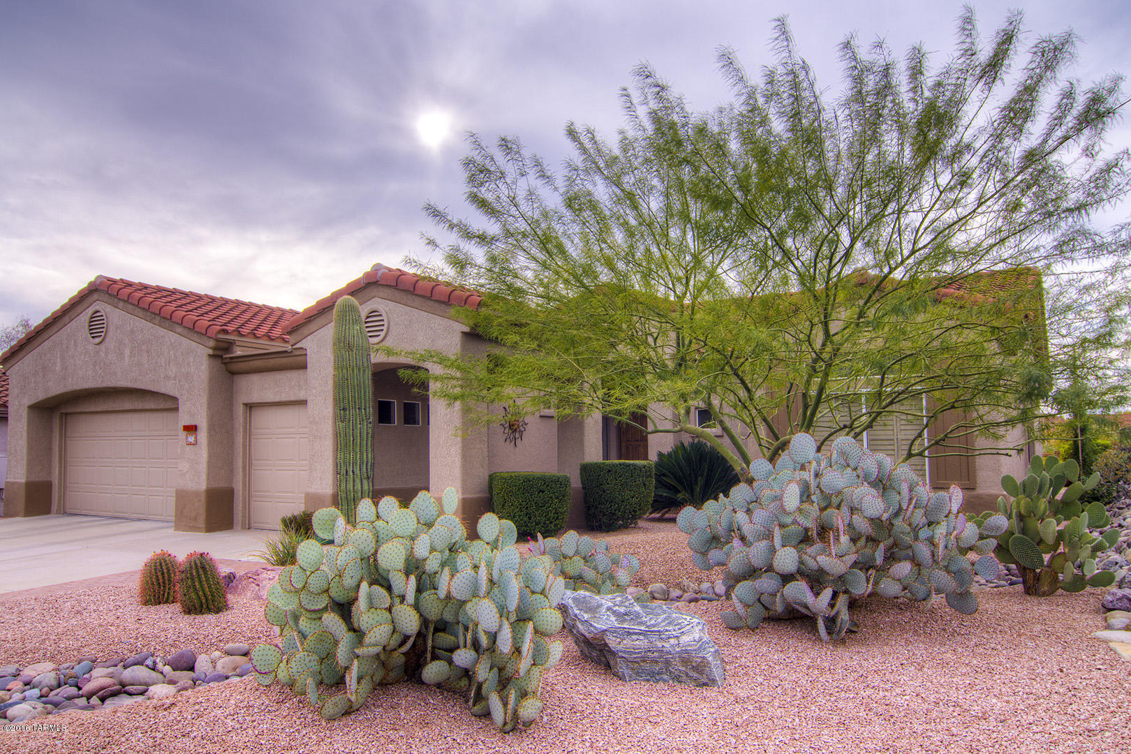 Beautiful & Elegant, great thought put into every last detail!  Enjoy the spectacular mountain, valley & city light views from your gorgeous flagstone patio. This popular Regent model is nestled on a premium lot. 2 Beds + den/office & 2.5 baths, everything has been highly updated w/classic style.  20” tile throughout common areas, wood in master & office, plantation shutters, stunning fireplace tile & glass enclosed master shower - just a few of many designer touches in every room. An inviting gourmet kitchen w/42” cabinets, LED lighting under/over cabinets, new gas cooktop & center island w/seating.  The laundry has been customized to provide ample storage/work area.  A rare 21’ x 8’ ext to the golf cart space for workshop/storage. This home has it all – come see all that Sun Ci
