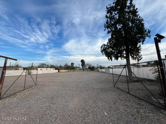 Vacant Land fully Fenced. 
Zoned Multi use Property,
Electric, Water And Sewer on Property. 

The Adjoining proper
 1337 W El Caminito Pl.