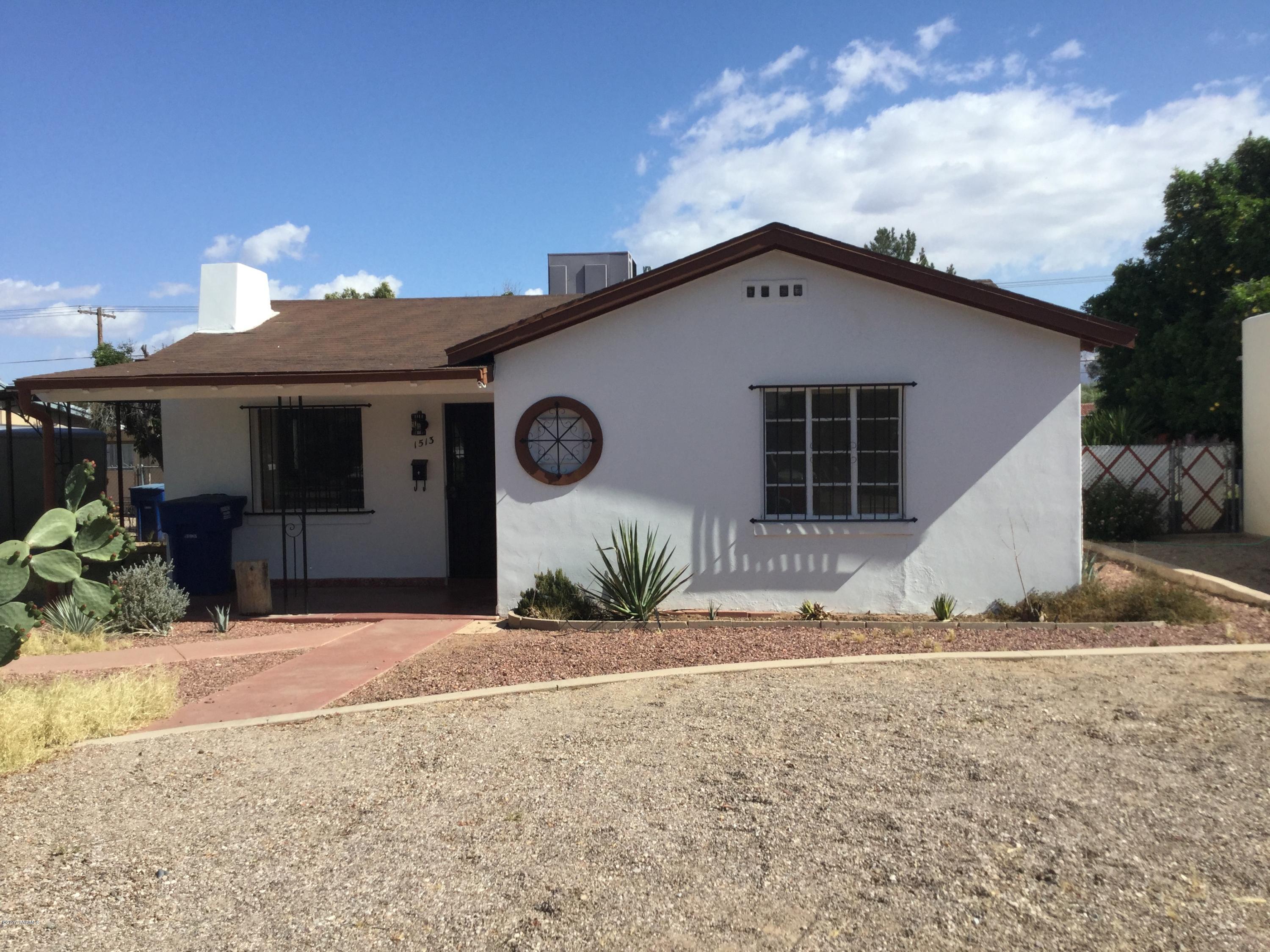 Charming Bungalow-Central location situated on large lot.. 2 bedrooms/ 1 full bath. Arizona room offers additional space and extra storage. Laundry at one side of Arizona room. Storage shed in rear yard. Carpet in bedrooms only. Ceramic tile in living areas. Concrete in Arizona room. Fan in Arizona room. NO CATS. Ask about P#321-YM