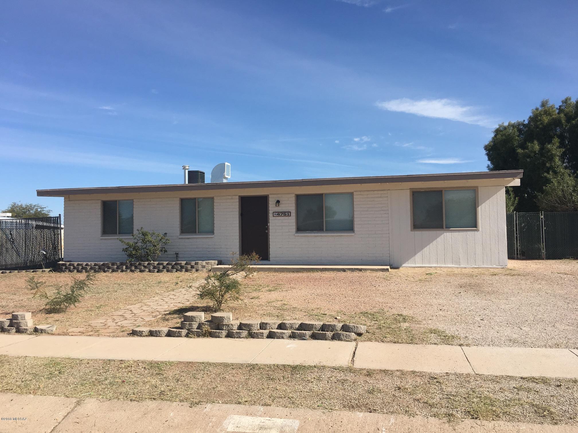 This fabulous 2 bed/1 bath home has a lot of charm to it.  Newly remodeled kitchen with tiled counter tops and newer black appliances.  Tile flooring throughout the home and a den for extra space and storage.  The backyard is large and open for all your entertaining needs.  *This one's pet-friendly* This house located at 4751 S Primrose St in Tucson, is waiting for you to make it your new home!