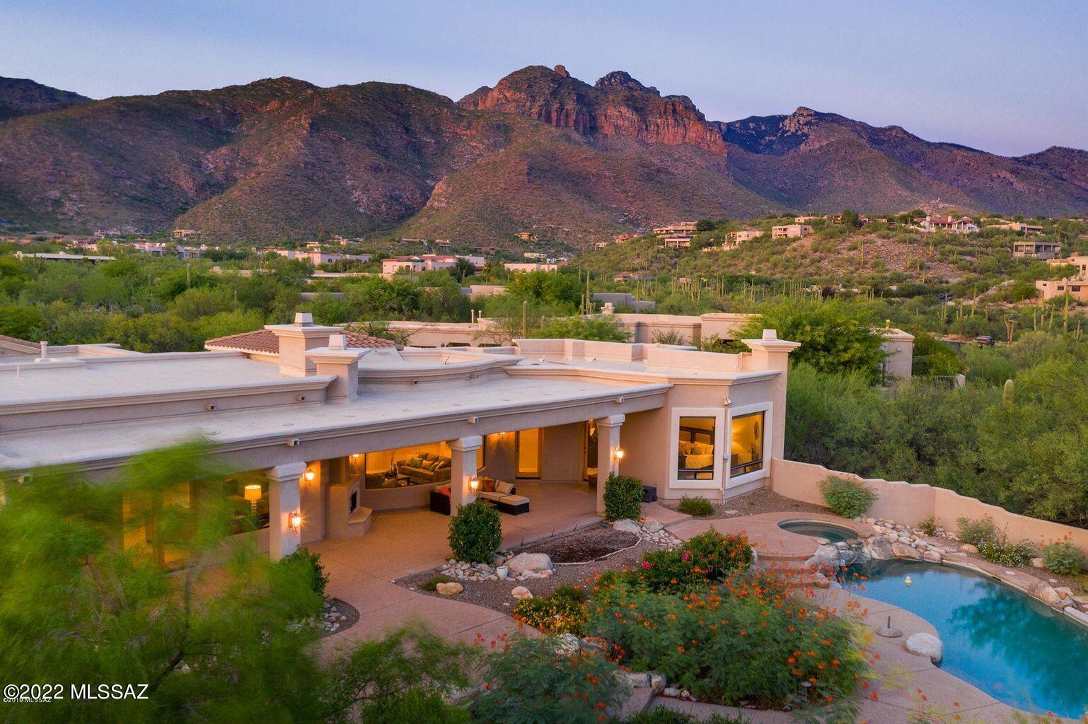 Spectacular Mediterranean estate in prestigious Pima Canyon. Enjoy magnificent mountain views and city lights! This elegant home features almost 3900 square feet on over 1 acre with four large bedrooms,  The backyard is perfect for entertaining on warm summer nights with a cool dip in the pool or cool winter evening with a barbecue! The only estate in Pima Canyon Estates under $2,000,000!