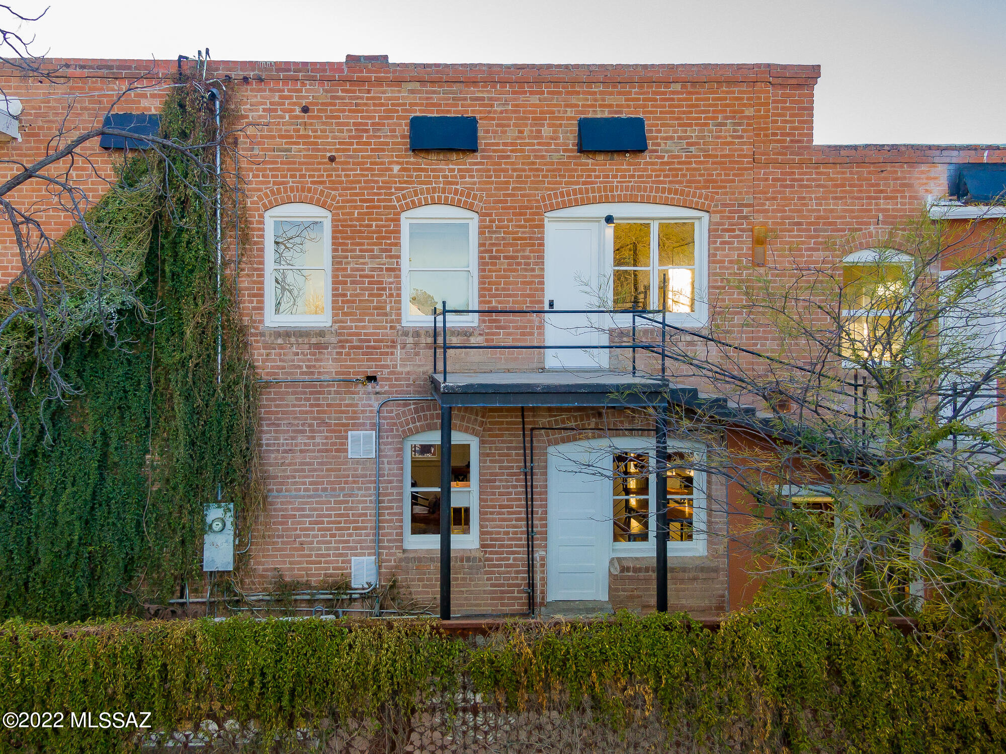 Amazing updated historic  home in the heart of downtown Tucson!  Sought after one of a kind brick beauty, lovingly restored  with impeccable designer touches.   
125 E. 15th St. represents the past, with all the modern conveniences of the 21st century.  From the solid mesquite front door, to custom metal work,  this property will not disappoint.  
Spectacular contemporary kitchen with quartz counters, new stainless steel appliances and  soft close cabinets.  Entertain in style with a spacious flow and tons of natural light.  
Luxurious bathrooms, solid, refinished wood floors and a chic loft like feel.  Display your art and treasures in one of Tucson's treasured homes.  Enjoy living 2 blocks from TCC, walking distance to gourmet dinning and a vibrant downtown community.  Tucson's Finest