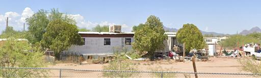 Attention Investors & Builders: Fire damaged property. Sold As-Is manufactured home, on two parcels. Sold in current condition, offering a canvas for renovation or redevelopment. Prime location, ripe for investment. Explore the possibilities today! Parcels 208-19-0360, 208-19-0350.