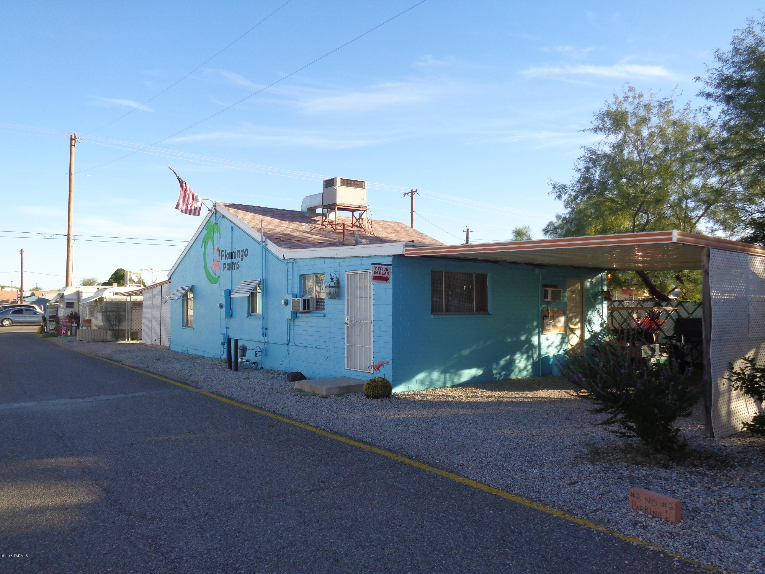 The Flamingo Palms MHP is situated on a 2.57 acre lot with 47 mobile home spaces and 4 small houses.  The park is centrally located in Tucson close to bus lines and shopping.   This is a turn key investment opportunity that offers immediate cash flow.  Lots of upside with property values and rents steadily rising in Tucson.  Tenants pay for all utilities including water.  Please do no disturb tenants.
