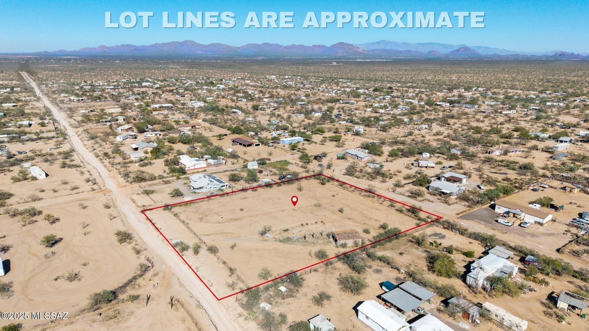 Discover the serenity of Southwest living on this expansive 2.15-acre parcel nestled in Tucson's Extended Southwest region. Zoned GR1 and offering sweeping mountain, sunrise, and sunset views, this property invites you to build your dream home or invest in a versatile land opportunity.

Enjoy the privacy of a chain-link fenced perimeter and the convenience of electric and city water available at the lot line. Located on a quiet dirt road with owner-maintained access, this parcel offers a peaceful retreat.

Whether you're seeking a tranquil homestead or a strategic investment, this listing is a rare find in Pima County. Call for more details!