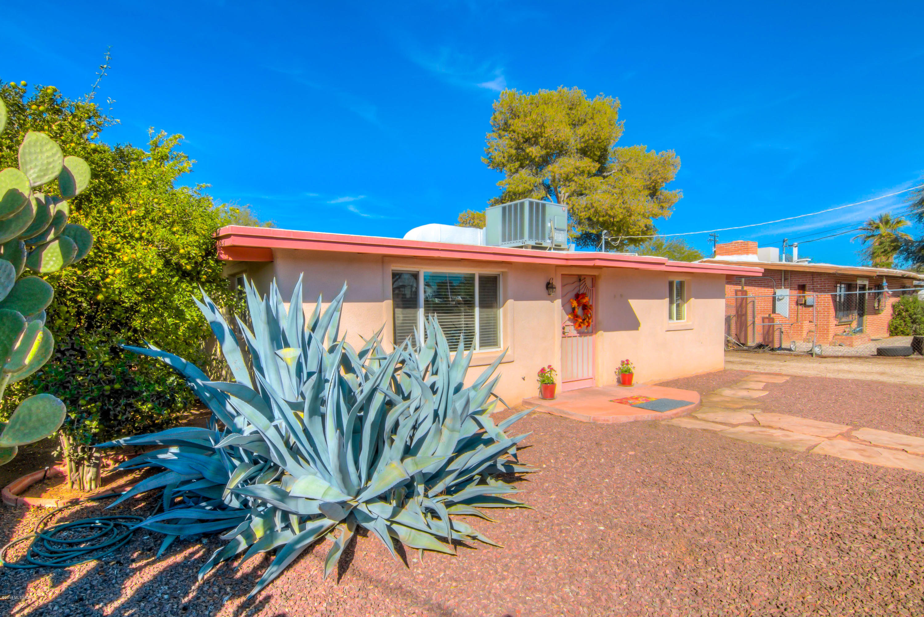 Great home on quite street. This lovely 2 bedroom 1 bath home is a perfect starter home or snowbird get-a-way. Great updated kitchen with gas stovetop. Beautiful exposed beam, lots of storage, and a HUGE backyard with mature trees. No HOA's. Close to downtown, shopping, schools, and restaurants.