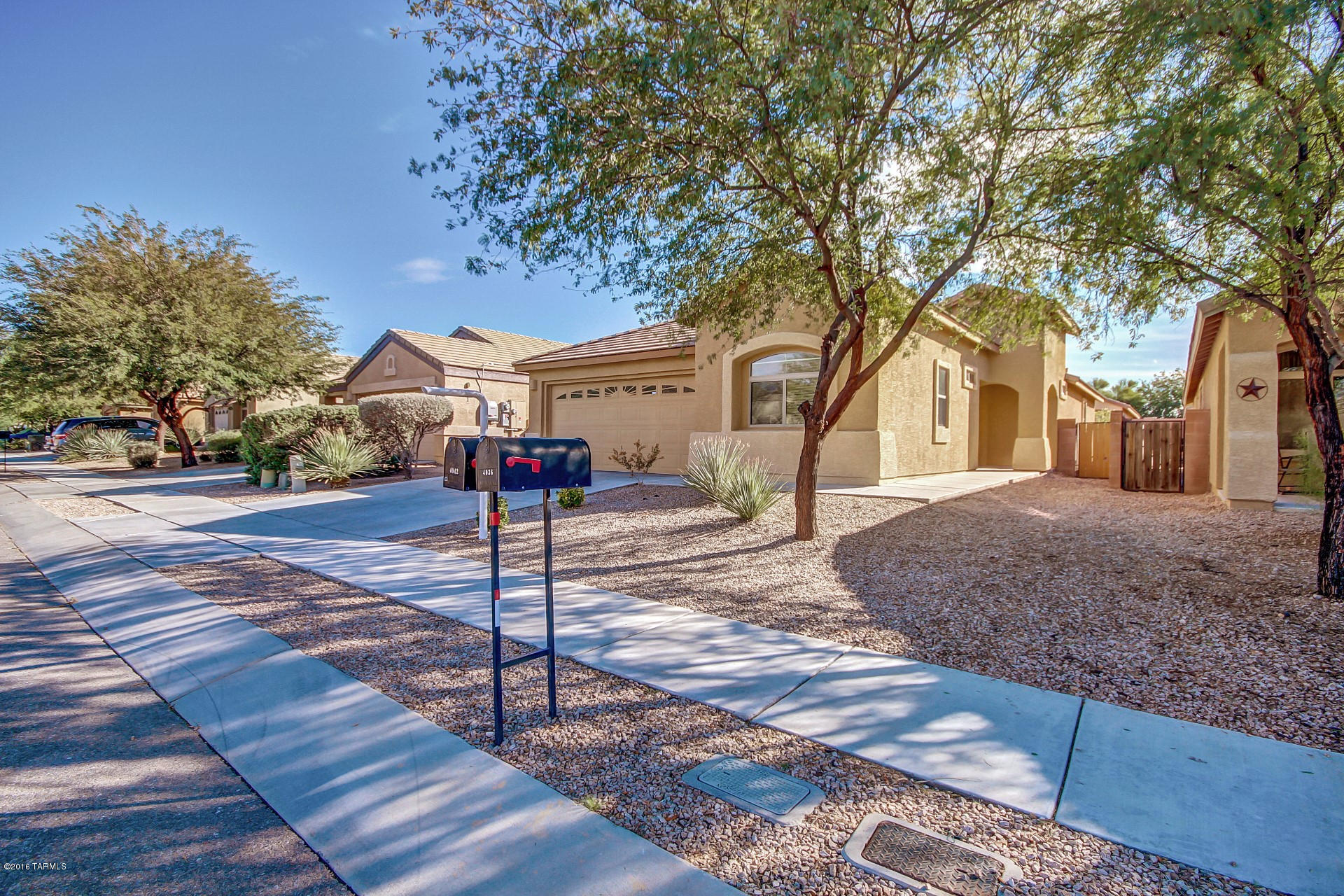 Fantastic move in ready home with 3 bed, 2 bath. Features an open floorplan with vaulted ceilings plus carpet and tile in all the right places. The wonderful kitchen comes with white appliances, plenty of cabinets, corian countertops and island with raised breakfast bar. Guest bedrooms have spacious closets and ceiling fans. The roomy master offers a private en suite with walk-in closet, double sinks and private toilet room. Peaceful and serene backyard has low maintenance landscaping and extended patio perfect for enjoying endless blue skies.