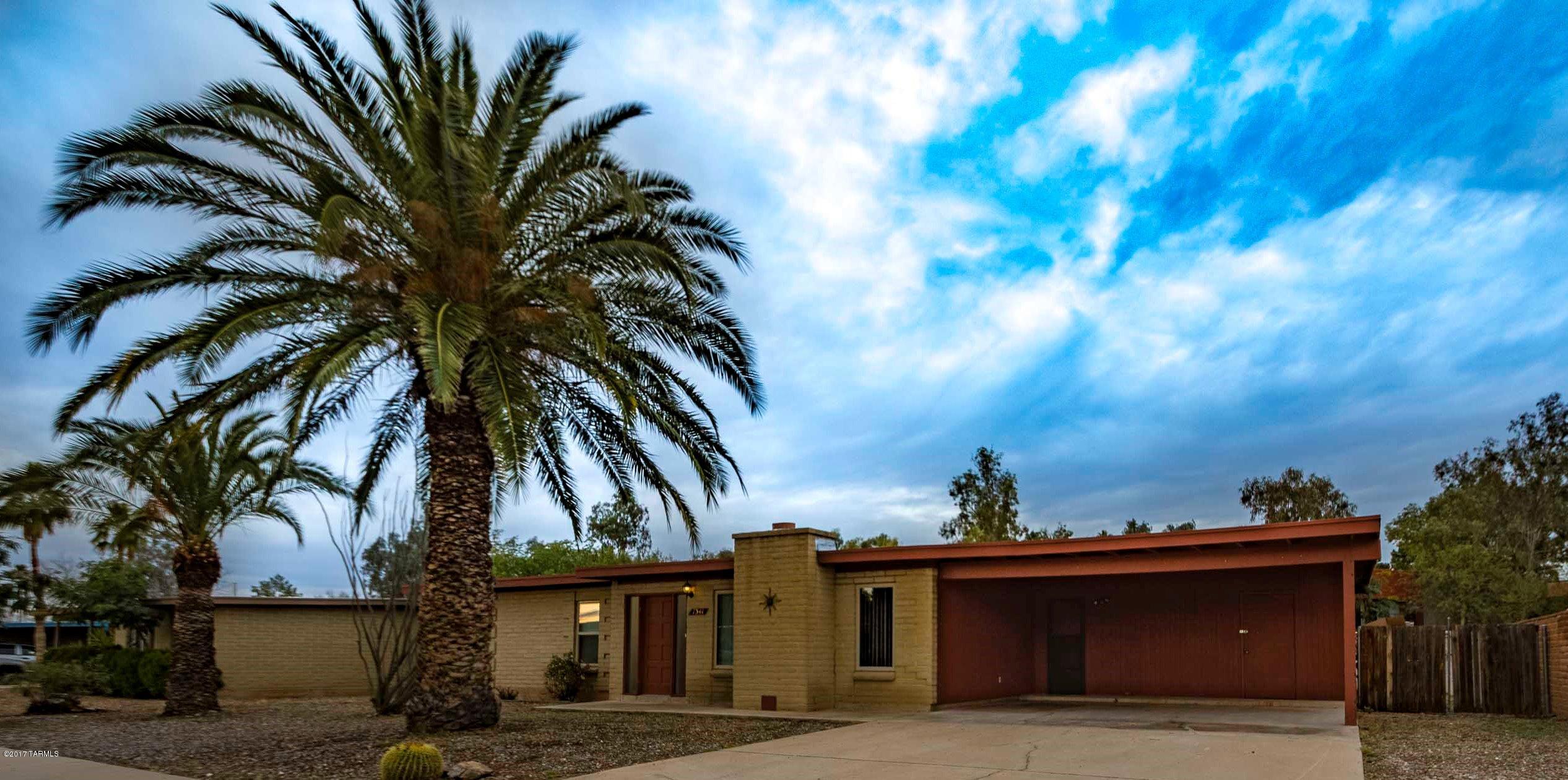 Seller will accept or counter offers between 150,000.00 and $155,000.00.  This Cute, Clean and Charming Eastside Home Features a Remodeled Kitchen with New Cabinets, Granite Countertops and Stainless Steel Appliances, New Tile in Dining, Kitchen and Laundry Room, Cozy Fireplace in Family Room, Fans in All Bedrooms, Newer Vanities in Bathrooms, Extra Large Laundry Room, Large Storage Room off Carport and Spacious Backyard. Front of Home has Dual Pane Windows.  Excellent Location Close to Shopping, Restaurants and DMAFB.  No HOA!  Don't Miss This Lovely Move In Ready Home! Property taxes reflect current status as a rental.