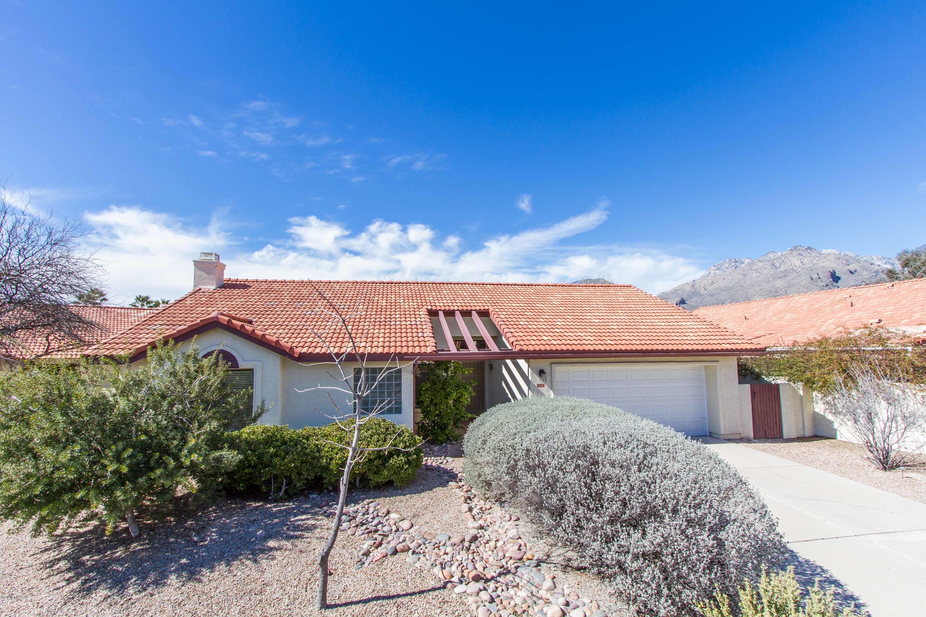 This is a one of a kind property located in the beautiful Sunrise Meadows neighborhood. The home has been professionally remodeled to a large open great room concept. Beautifully updated kitchen with granite counter tops, huge granite island and upgraded appliances and cabinets. The third bedroom can be used as home office or den. Spacious master suite with a upgraded master bath and upgraded shower area. The guest bath has also been remodeled and modernized. Wonderful wood flooring in the living areas. Back patio is perfect for entertaining and enjoying views of the Catalinas. The home has a prime, desirable location, close to Ventana Canyon Resort, several restaurants, popular hiking areas and beautiful Sabino Canyon State Park. All furnishings in the home are available.