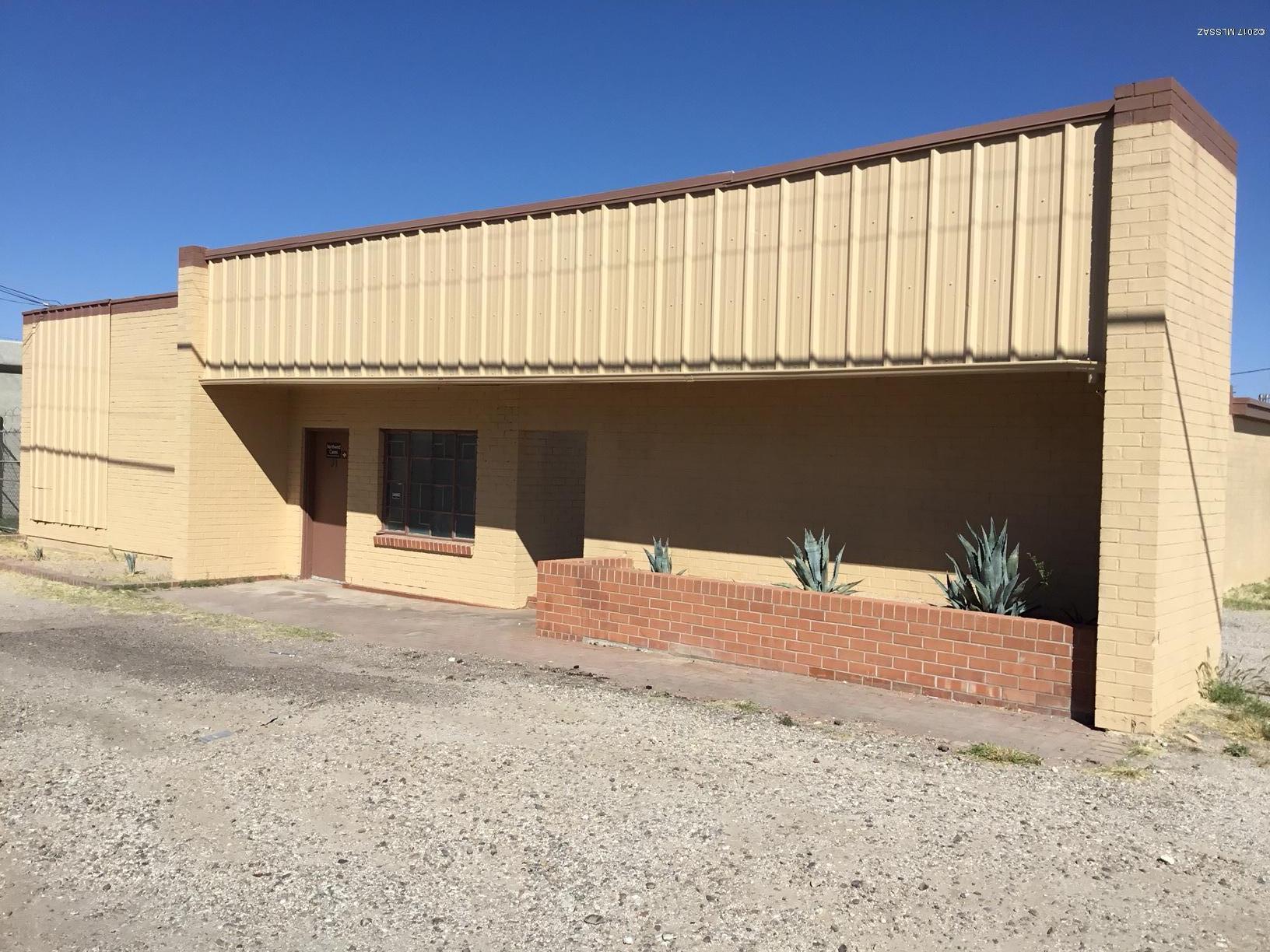 Industrial warehouse includes 2 parcels with easy access to I-10 and abundant parking or room to increase yard space. Building is 50 percent air conditioned with office space, conference room, two rest rooms and 50 percent is warehouse, with evaporative cooling for warehouse,  with 9' roll-up door.  Plenty of room for growth and expansion. Parcel #'s 115-05-1570 & 115-05-1580. 3-Phase Power 600 amp service. Property lies in an Opportunity Zone and can provide investor with tax benefits.