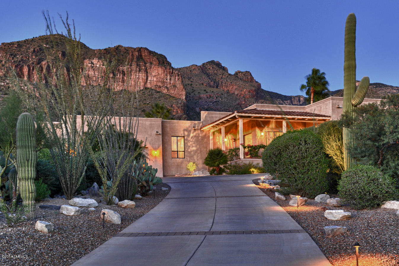 Absolutely gorgeous! ''Wow- views'' of the mountains and City. Stunning contemporary tastefully decorated and designed with no steps! Completely rehabed and updated in 2004.  Truly a custom home with classy touches! Four bedrooms and ultra- work out room, could be turned back into 5th bedroom. Dream kitchen with GE monogram 5 burner gas stove with pop-up vent, side by side refrigerator, 2 ovens, dishwasher, sharp microwave.  A closet-to-die-for and luxury master bath, double sub-zero wine refrig. will hold many wine bottles, Travertine floors, granite counters,beautiful cabinets and other built-ins, full wet bar, Solar water for the salt pool & spa.  Perfect home for entertaining!  NO NEED to PREVIEW!