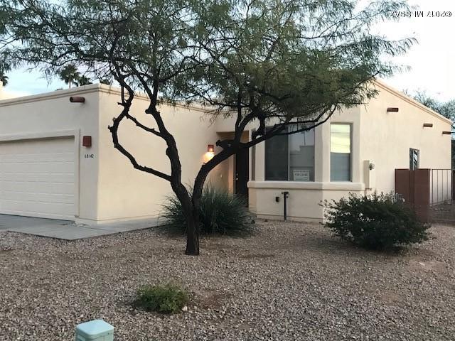 This beautiful 3 bedroom 2 bathroom townhouse has a great open layout. High ceilings, Southwestern architecture with views of the Santa Catalina Mountains. Two car garage. It has Italian tile and Berber carpet. AC and ceiling fans throughout the place, with skylights inside and in the garage. Covered porch with enclosed backyard. All appliances that include a refrigerator with ice maker, self cleaning oven, and a built-in microwave. In Amphitheater school district. Must see!
