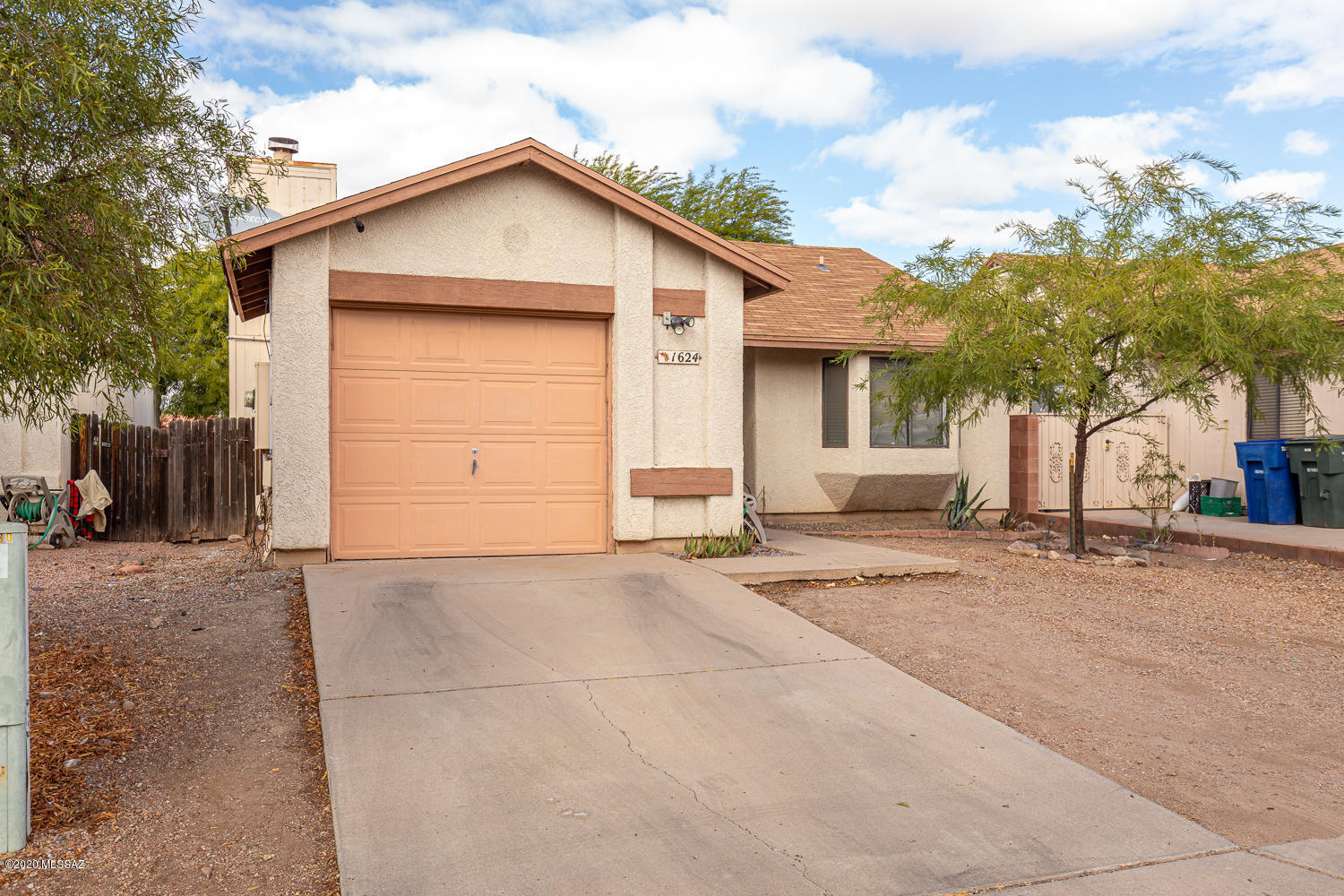 Seller shall counter or accept offers from $160,000-$170,000. Beautiful home located close to many amenities and with many upgrades. This home offers 2 bedrooms, 1 bathroom and an office/den area. Upon entering the home you will walk into a beautifully remodeled kitchen with granite countertops, stainless steel appliances and a farm sink. This home has also been updated with beautiful ceramic tile all throughout. Plenty of backyard space  to make it your very own oasis and a 1-car garage. Newer AC and water heater was replaced within the last year.