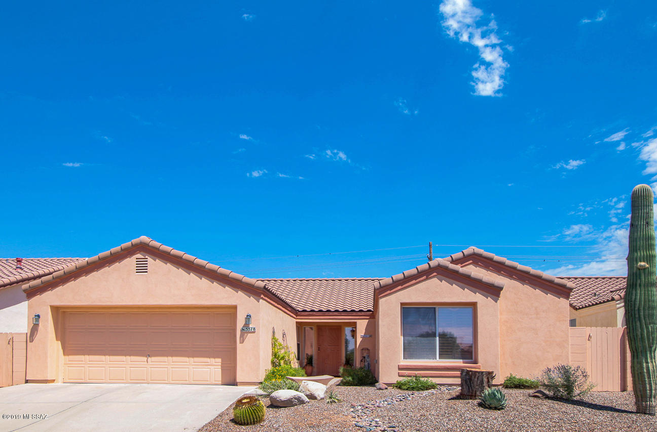 Located in North Ranch is this 3 bedroom + den (located off master - would be easy to add door to hallway for a 4th bedroom), 2 baths & 2 car garage.  Backs to North boundary of North Ranch with no one behind property.  All poly piping was replaced in 2018.  Kitchen was remodeled with white cabinets and included soft close drawers, crown molding, Quartz countertops, Stainless appliances and much more.  Microwave is located inside cabinet pantry.  Baths were remodeled using quartz countertops also.  Large great room has a fireplace with electric logs for convenience.  Plantation shutters.  Wood vinyl throughout home except for carpeted bedrooms.  Back yard entertaining from the covered patio and the screen in patio off master bedroom.  Patios run full length of home.  This is a must see