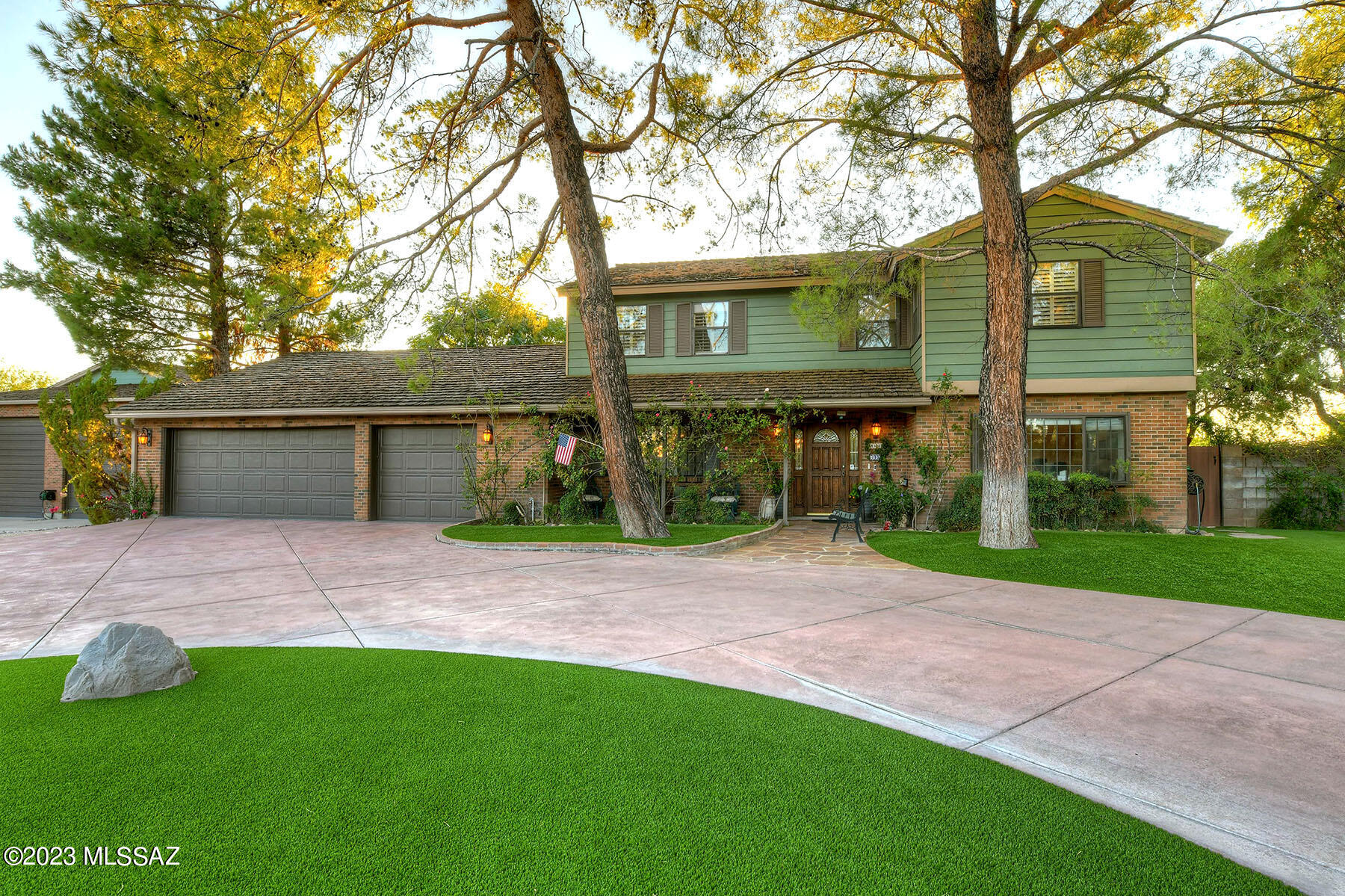 Imagine . . . feeling like you are out in the country on 1.31 acres surrounded by lush trees, grass, privacy, in your 2,821 sq. ft., 4 bedroom ranch style home with pool, spa, pond and waterfall . . .yet you are close to town and shopping.  Then imagine an attached 3 car garage with storage, 2 car carport and 10 car detached 34'2'' X 67' RV garage and shop with half bath, ideal for collectors and hobbyists (so room for 15 cars).  Imagine no further because here it is located near Wrightstown Rd. and Pantano Rd.  Electronic gated entry leads to circular driveway, into foyer of the home, with formal dining room, separate living room, separate kitchen/family room with generous Corian counter space and cabinetry, ceramic tile floors and floor to ceiling brick, heatalator, wood burning fireplace.  Gracious primary suite has brick wood burning fireplace, spa tub and outside covered balcony overlooking the oasis-like rear yard.  Many custom touches in this one-owner home including plantation shutters, close to schools, shopping and so much more.  See to appreciate.