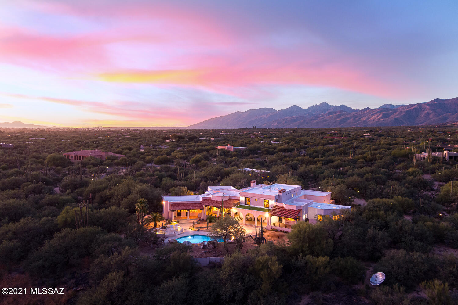 Live in complete privacy & seclusion w/ glorious, up-close Rincon mountain views from this exceptional 7.2 acre horse property w/ 2 guest houses located in La Cebadilla Estates in the lush Tanque Verde Valley, the green jewel of the desert.  This sanctuary style equestrian estate is minutes from the famed Tanque Verde Guest Ranch, this area is steeped in rich history & designed for sparse population providing starry nights, dreamy sunrises & sunsets, mesquite bosques & abundant desert wildlife. This one owner 6788 sf custom home has dramatic high ceilings, wood-beamed ceilings w/ corbels, charming fountain & tons of windows pouring in natural light.Huge studio off entry is the perfect artist studio, workout room or whatever you may need. Formal living room w/ FP & formal dining room.CONT Spacious kitchen w/ center island, double ovens, Mexican tile counters & custom cabinets has huge walk-in pantry.  Lovely breakfast nook w/ gorgeous views. Cozy family room off kitchen w/ wood burning fireplace.  Huge owner's suite downstairs w/ wood floors, FP & 2 walk-in closets(one cedar). Oversized owner's suite bathroom w/ dbl vanities, large shower & bonus sun room. Upstairs 2 generous sized bedrooms w/ jack & jill bathroom, beautiful rock-faced FP & stunning view balcony. Deep covered patio off the kitchen & family room leads to big backyard w/ sparkling pool w/ waterfall & inspiring mountain views. One 887 sf guest house has 2 bedrooms & is adjacent to the main house. The second guest house w/ 684 sf is separate from the main house. Short walk to six stall horse facility w/ tack room, huge storage & turn-outs.  La Cebadilla has a community catch & release lake. 4-CAR garage. 

Perfect multigenerational compound or home for entertaining friends and family.

New roof 2021, New HVAC 2021, termite treatment 5/2021 w/ Truly Nolen-warranty in place, doors replaced, pool resurfaced, pool heater & filter replaced.

In the area: Live in seclusion with proximity to schools, a myriad of outdoor activities and golf clubs. Located in the "A" rated, excelling public school district-- Tanque Verde school district. Tanque Verde Elementary School, Emily Gray Middle School and Tanque Verde High School all very close and are all high-performing schools with a variety of activities and youth programs.

Less than 5 minutes away from the 49ers Country Club.
Spread over 110 acres, the course is known for its lush, mature landscaping and excellent course conditioning.
A full service restaurant open to the public, The Rincon Mountain Grill, has been expanded and upgraded serving breakfast, lunch and dinner 7- Days a week with various specialty offers.
Forty Niners CC has a swim team for the kids, summer camps, and several events throughout the year.
New workout facility for fitness training is fully equipped, 24 hour access and tons of fitness classes.

Just 15 minutes away is the Arizona National Golf Club:
Arizona National Golf Club, designed by Robert Trent Jones Jr, was voted best public golf course in Tucson, Arizona.



Convenient location to get to Mt. Lemmon.with a summit elevation of approximately 9000 ft. is the highest point in the Santa Catalina Mountains. It is located in the Coronado National Forest north of Tucson, Arizona and is an incredible retreat from the hot temperatures in Tucson in the summer. Enjoy skiing, hiking, biking and rock climbing.
Saguaro National Monument East-Located on the east-side, Tucson's cactus forest   tucked within Saguaro National Park East and nestled up against the Rincon Mountains   is as starkly beautiful as any primeval forest you've ever seen or imagined.

Take Speedway Blvd directly to the University of Arizona & downtown in 20-25 minutes.